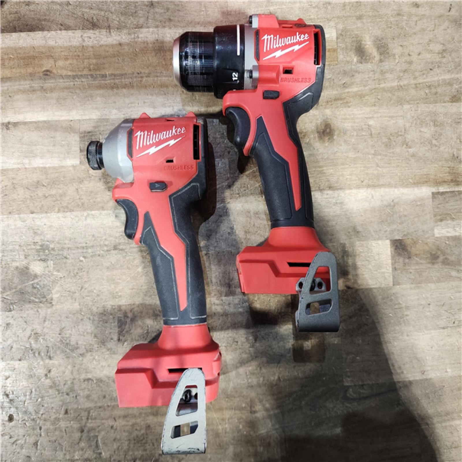 HOUSTON LOCATION - AS-IS Milwaukee M18 18V Lithium-Ion Brushless Cordless Compact Drill/Impact Combo Kit (2-Tool) W/(2) 2.0 Ah Batteries  Charger & Bag