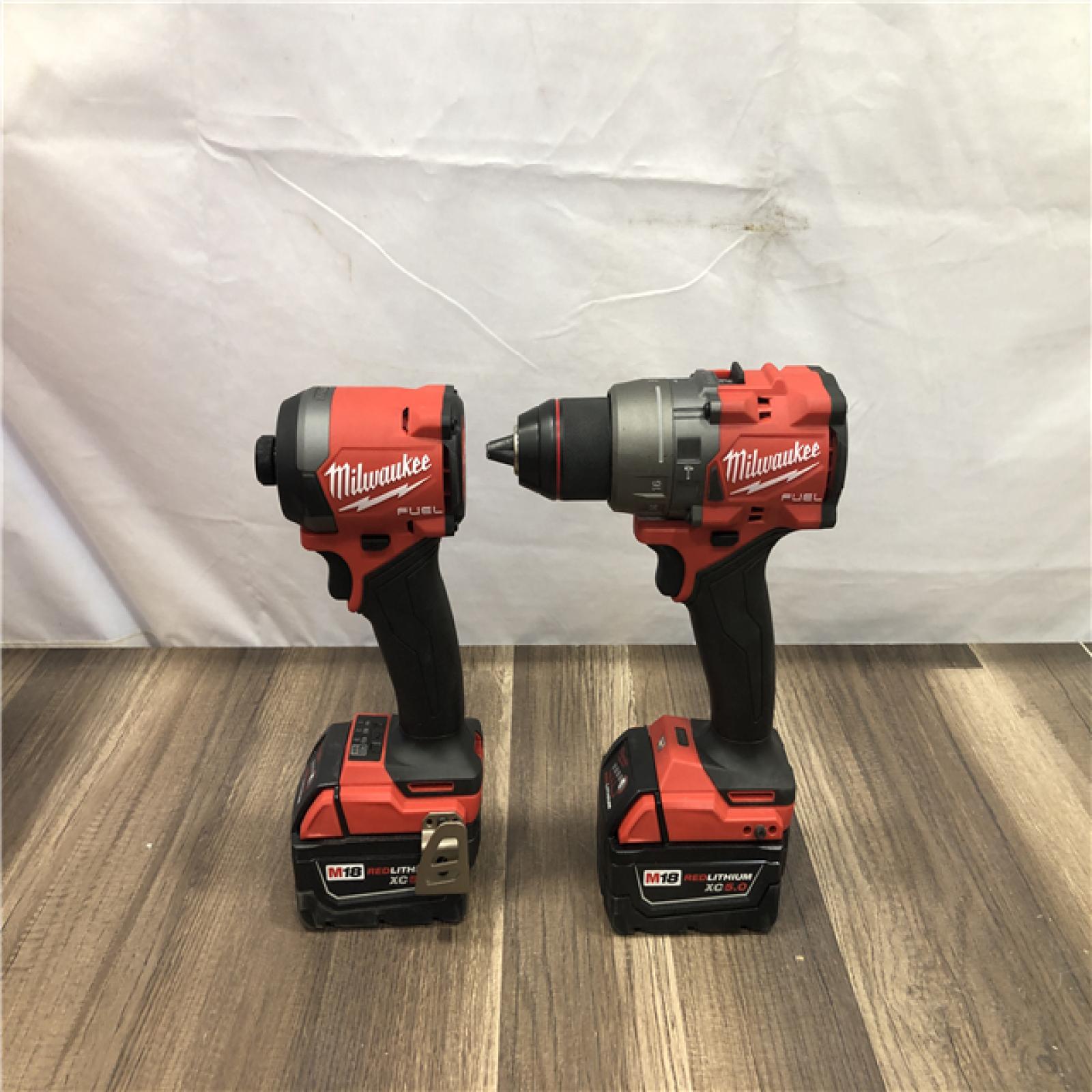 AS-IS Milwaukee  FUEL 18V Lithium-Ion Brushless Cordless Hammer Drill and Impact Driver Combo Kit