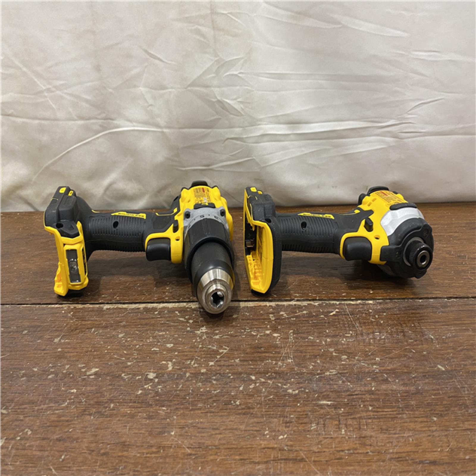 AS-IS DEWALT 20V MAX XR Hammer Drill and ATOMIC Impact Driver 2 Tool Cordless Combo Kit with (2) 4.0Ah Batteries, Charger, and Bag