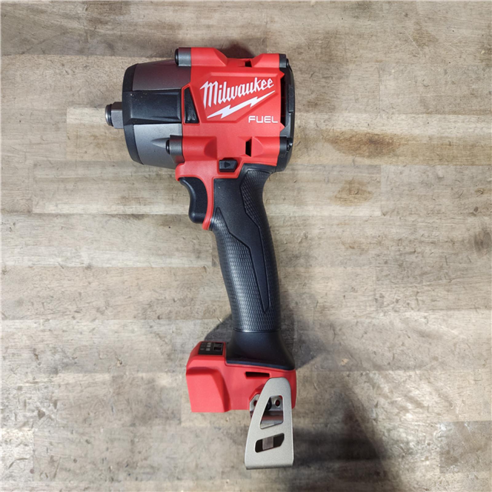 HOUSTON LOCATION - AS-IS (APPEARS LIKE NEW) Milwaukee 2962-20 M18 18V Fuel 1/2 Mid-Torque Impact Wrench Cordless Lithium-Ion Brushless (Tool-Only)