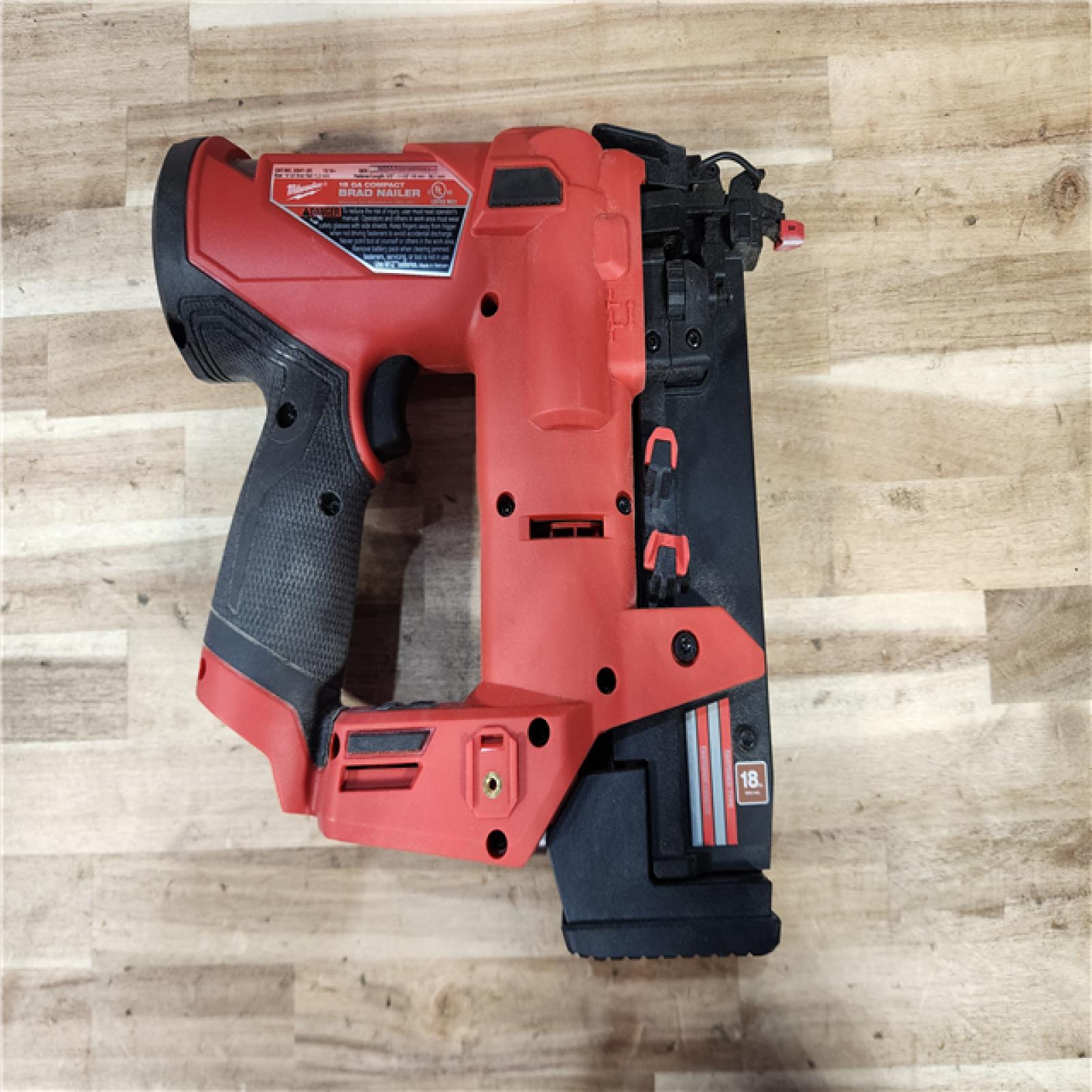 HOUSTON LOCATION - AS-IS Milwaukee FUEL 12-Volt Lithium-Ion Brushless Cordless 18-Gauge 1-1/2 in. Compact Brad Nailer (Tool Only)