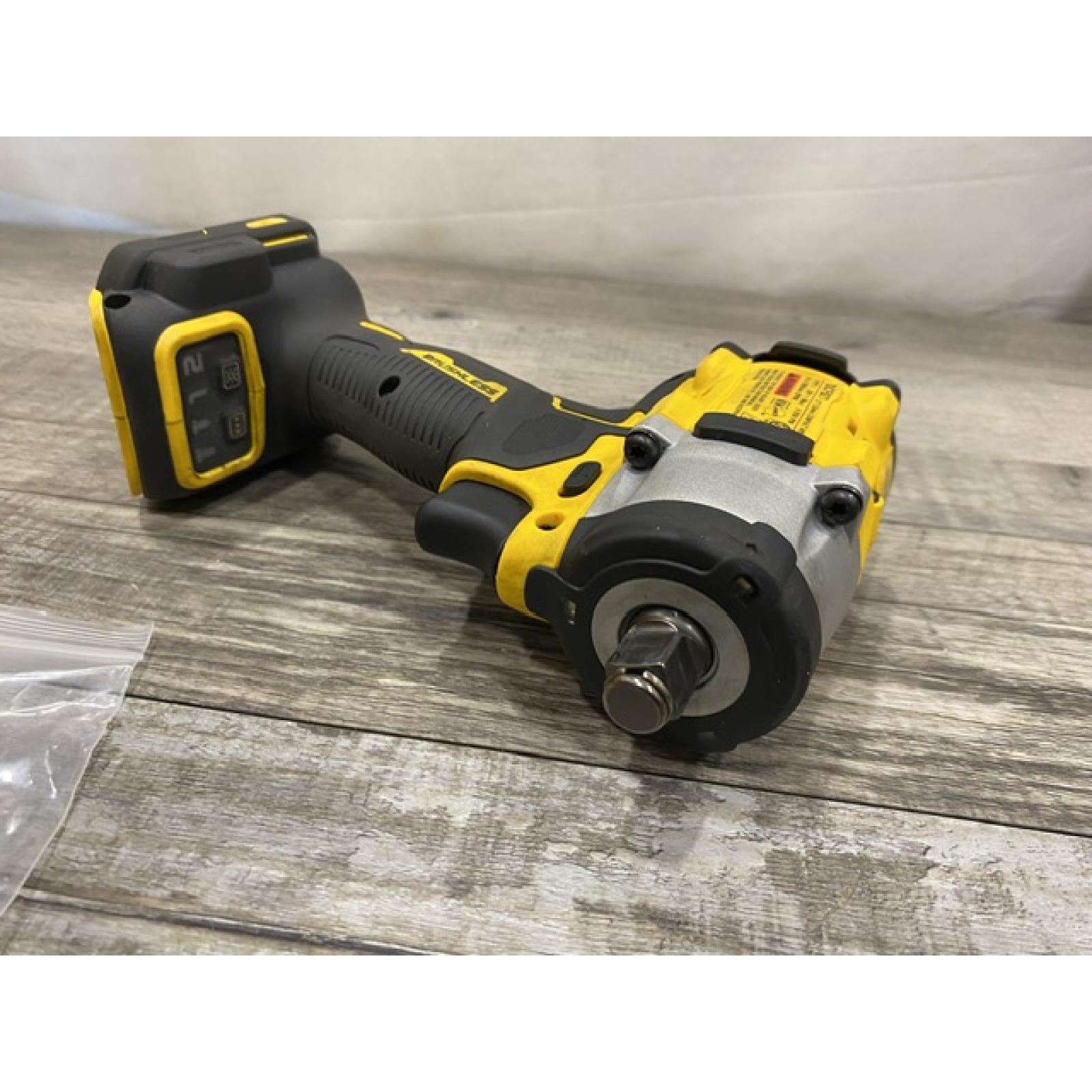 AS-IS DEWALT ATOMIC 20V MAX Cordless Brushless 1/2 in. Variable Speed Impact Wrench (Tool Only)