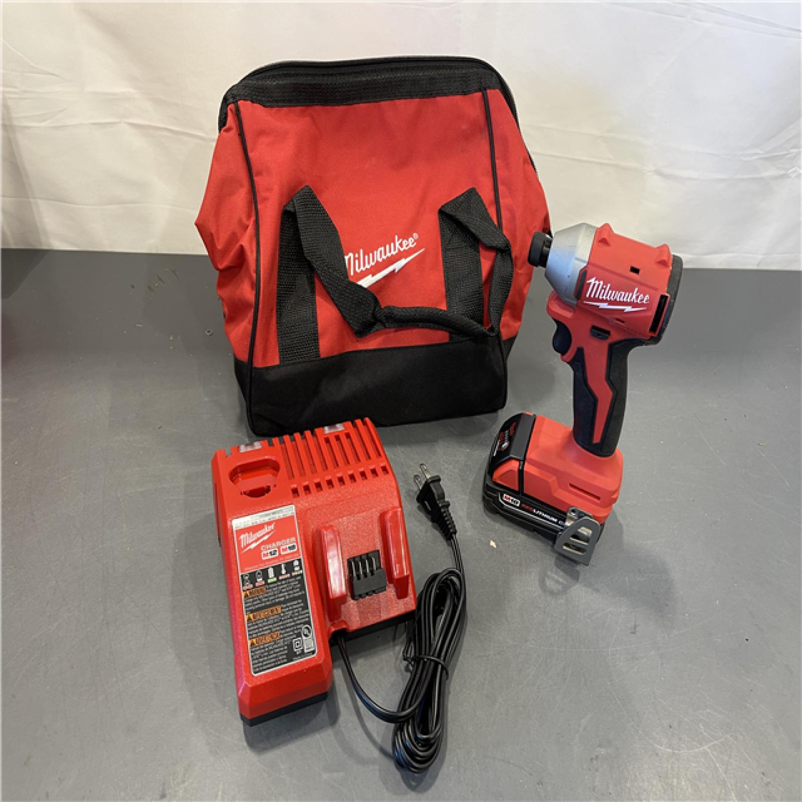 AS-IS - Milwaukee M18 Compact Brushless 1/4  Hex Impact Driver Kit