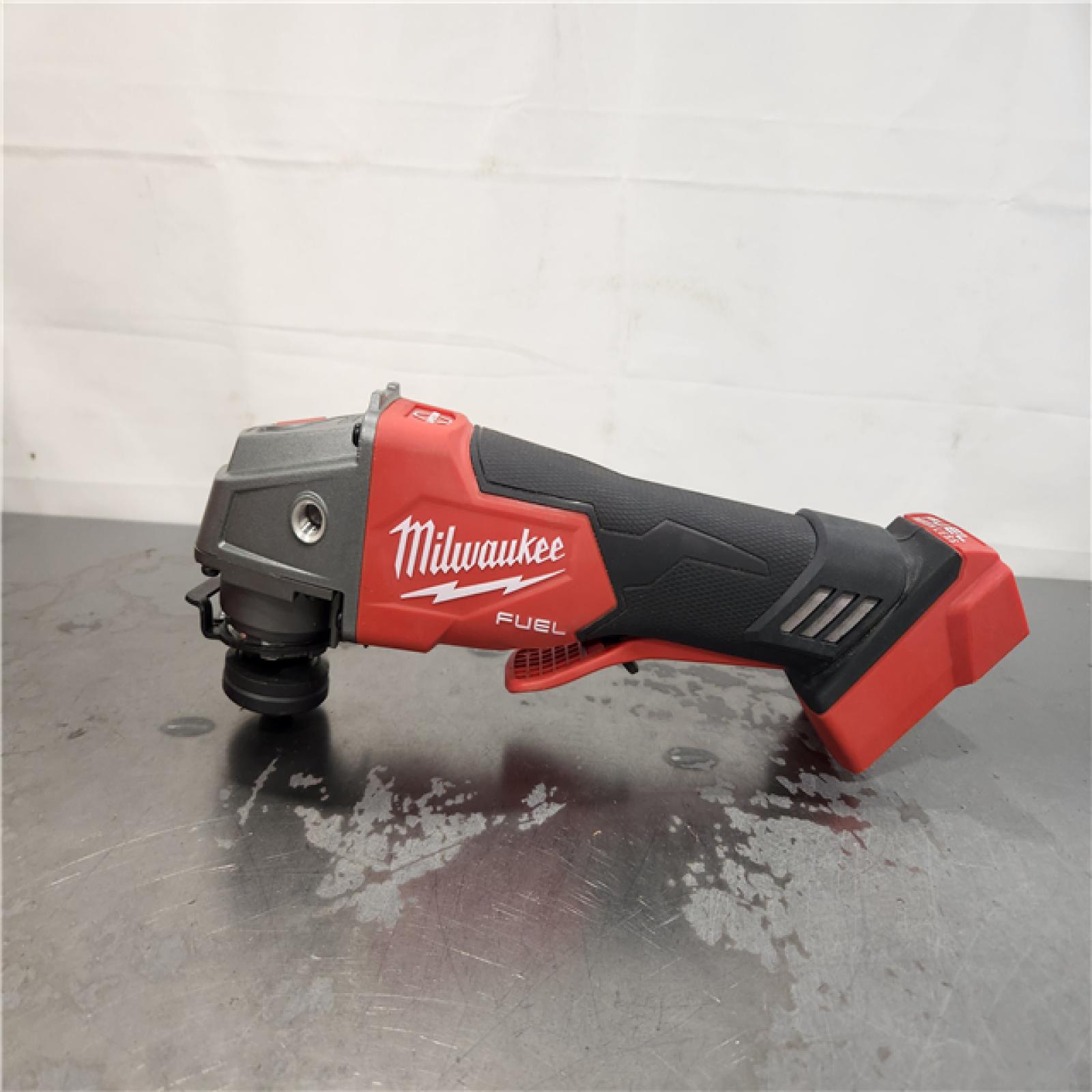 AS-IS- Milwaukee FUEL 18-Volt Lithium-Ion Brushless Cordless 4-1/2 in./5 in. Grinder W/Paddle Switch (Tool-Only)