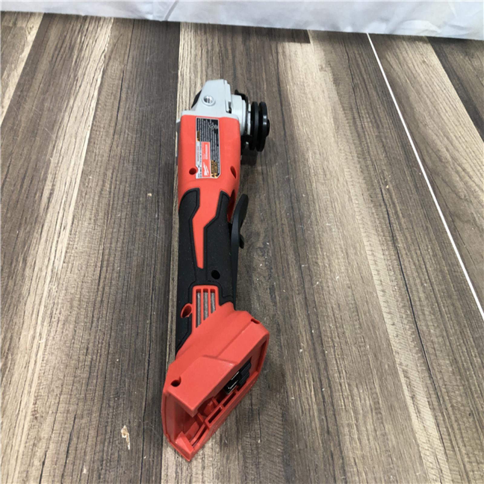 AS-IS Milwaukee 18V Lithium-Ion Brushless Cordless 4-1/2 in./5 in. Grinder w/Paddle Switch (Tool-Only)
