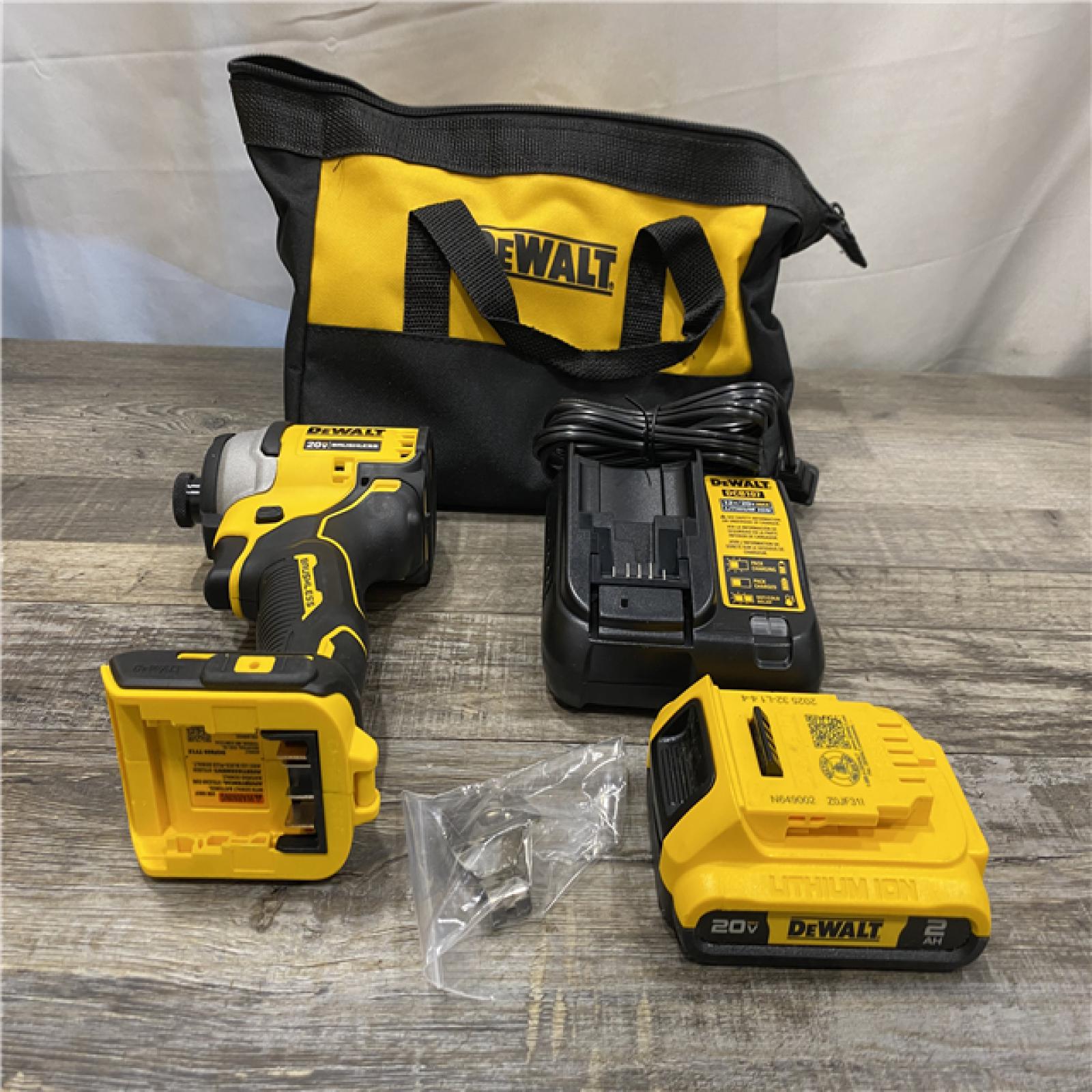 AS-IS DEWALT Atomic 20V Max Lithium-Ion Brushless Cordless Compact 1/4 in. Impact Driver Kit