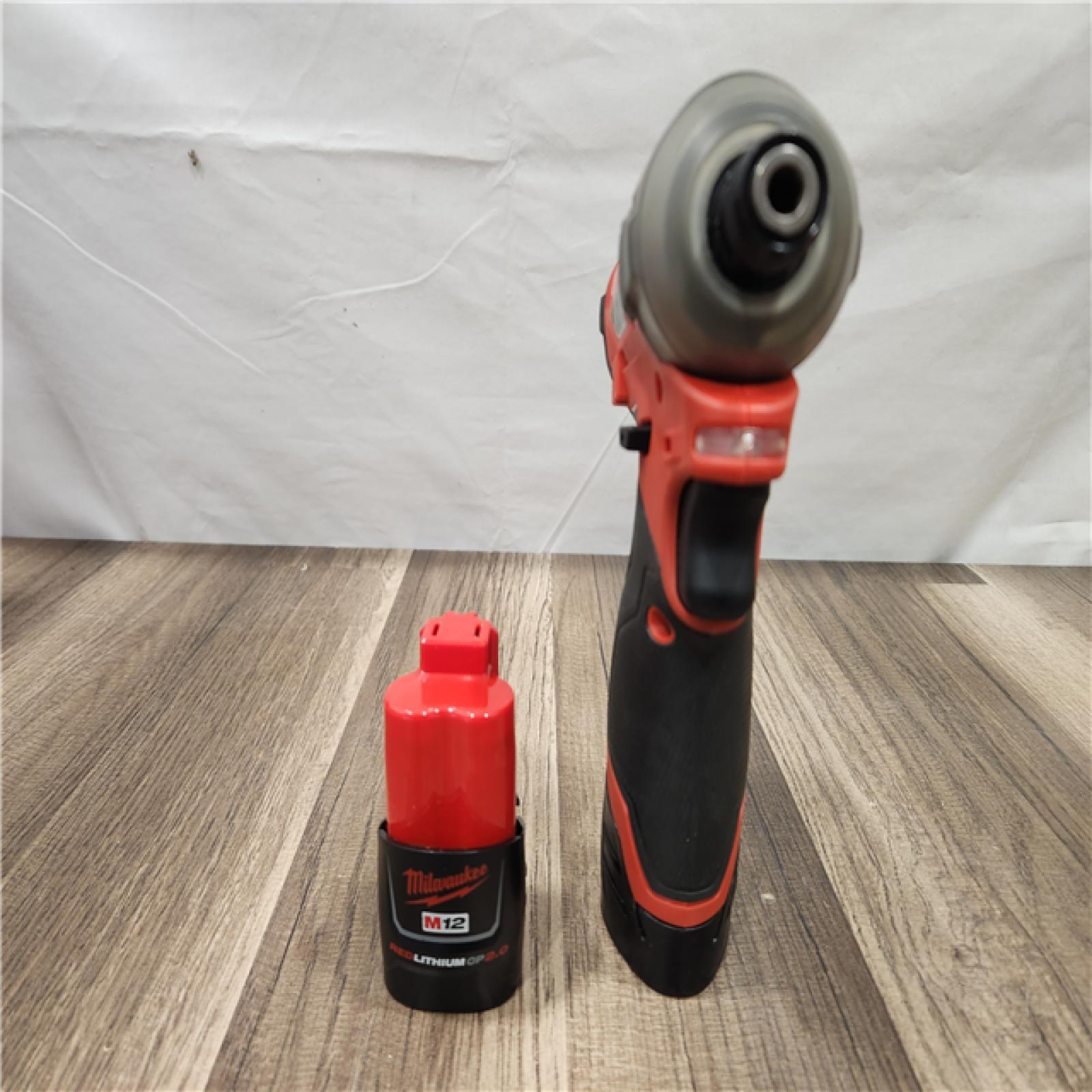 AS-IS- Milwaukee M12 FUEL SURGE 12V Lithium-Ion Brushless Cordless 1/4 in. Hex Impact Driver Compact Kit W/Two 2.0Ah Batteries  Bag