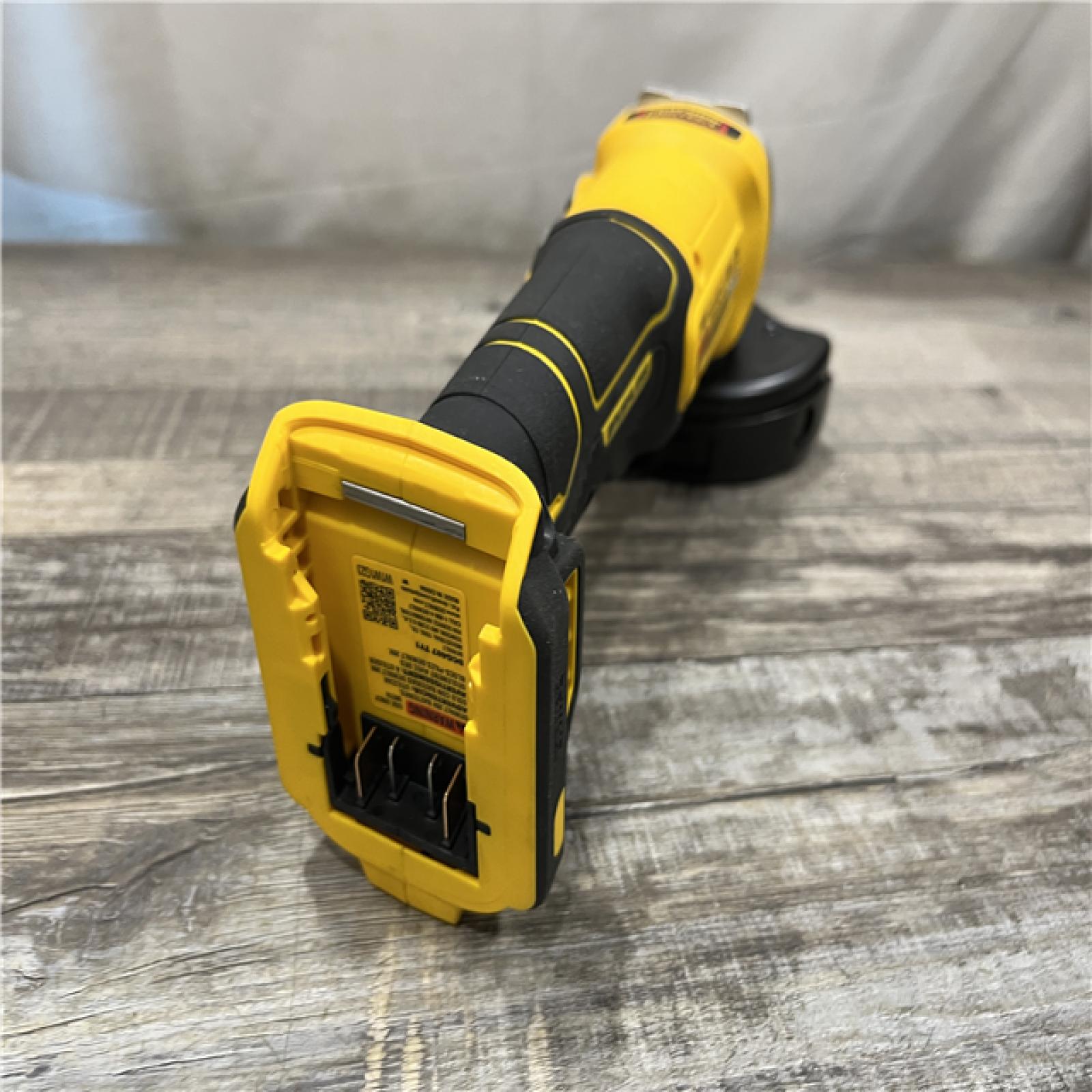 AS-IS DEWALT 20-Volt MAX Cordless Brushless 4-1/2 in. Angle Grinder with Slide Switch (Tool Only)