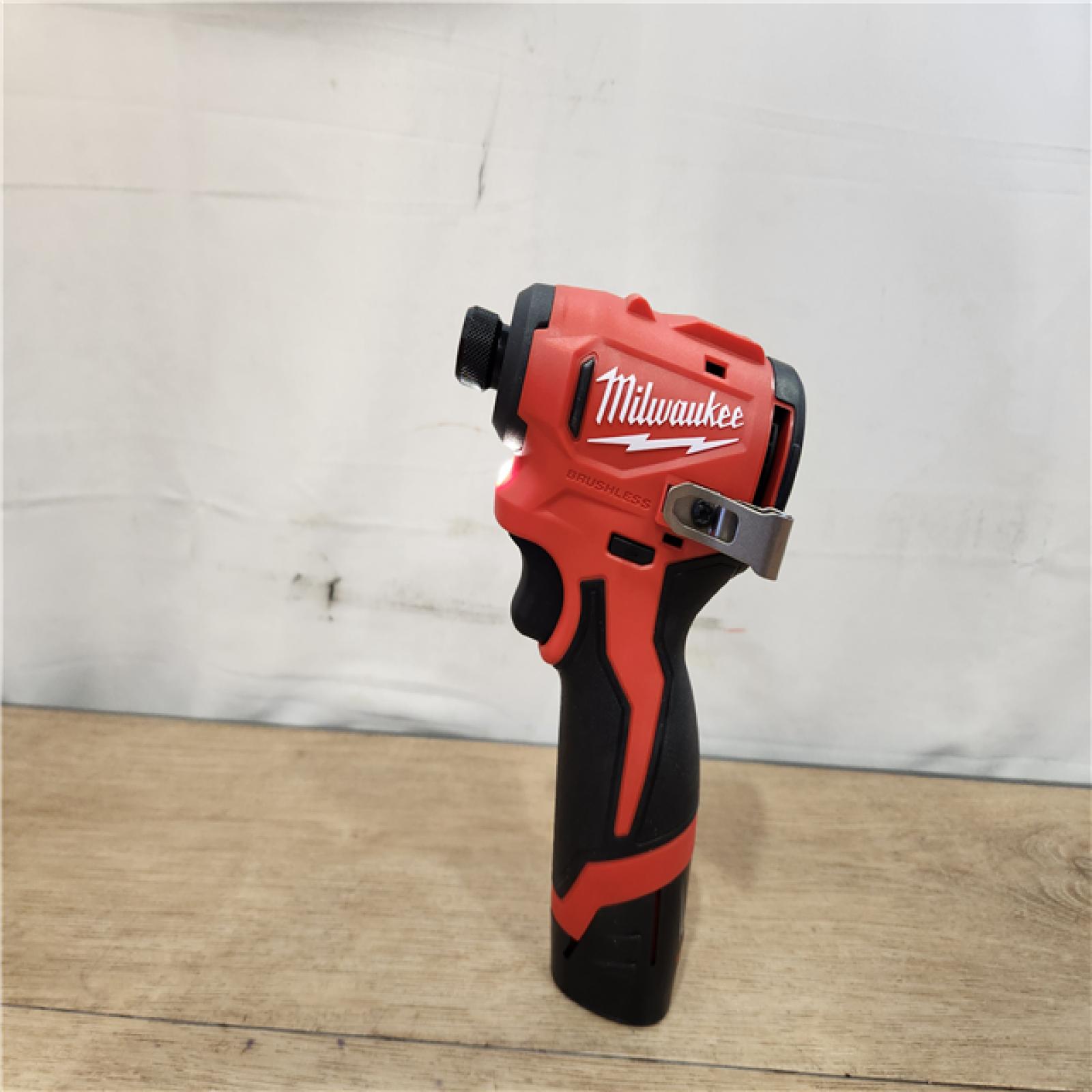 AS-IS- M12 12-Volt Lithium-Ion Compact Brushless Cordless 1/4 in. Impact Driver Kit W (2) 2.0 Ah Batteries  Charger & Tool Bag