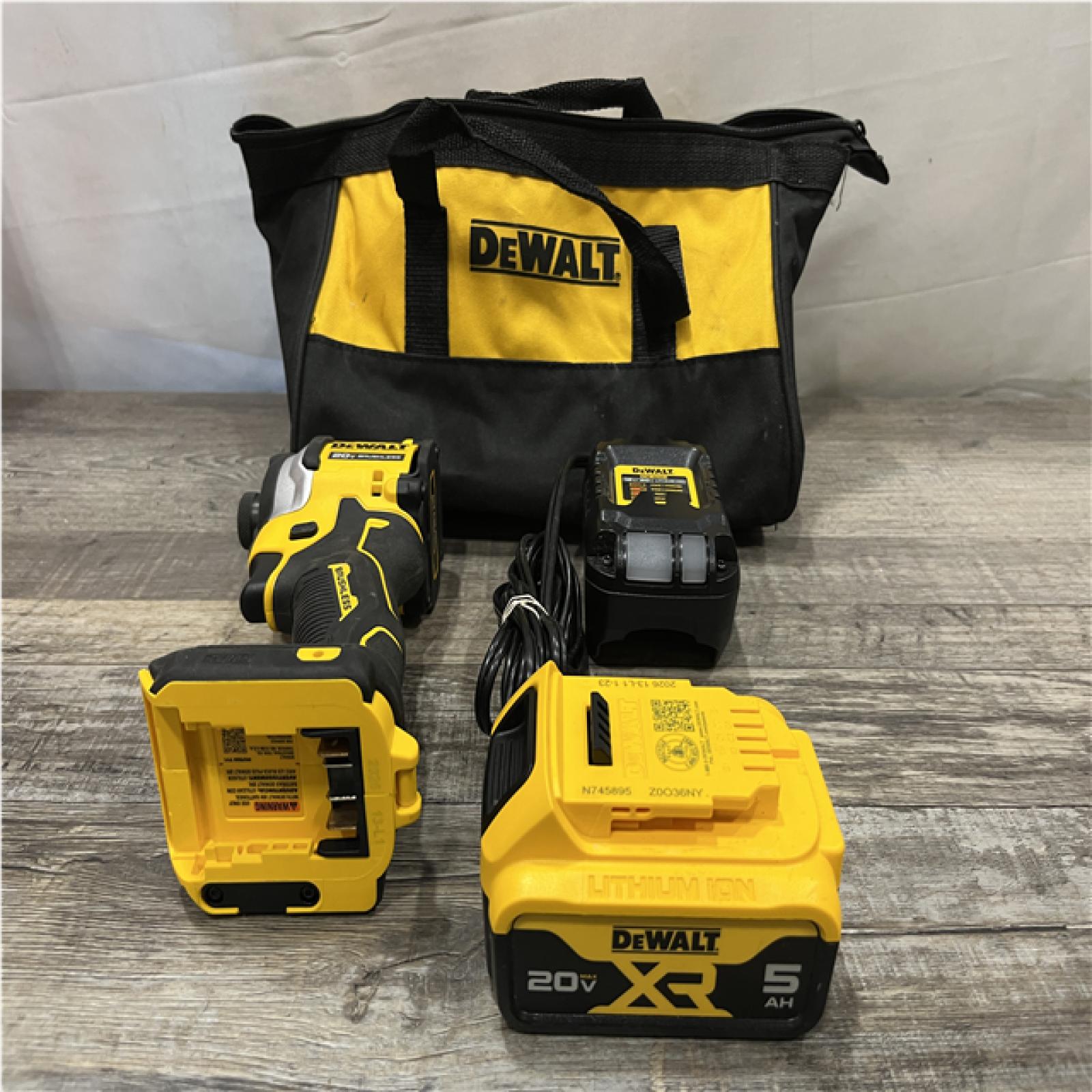 AS-IS DEWALT ATOMIC 20V MAX Lithium-Ion Cordless 1/4 in. Brushless Impact Driver Kit