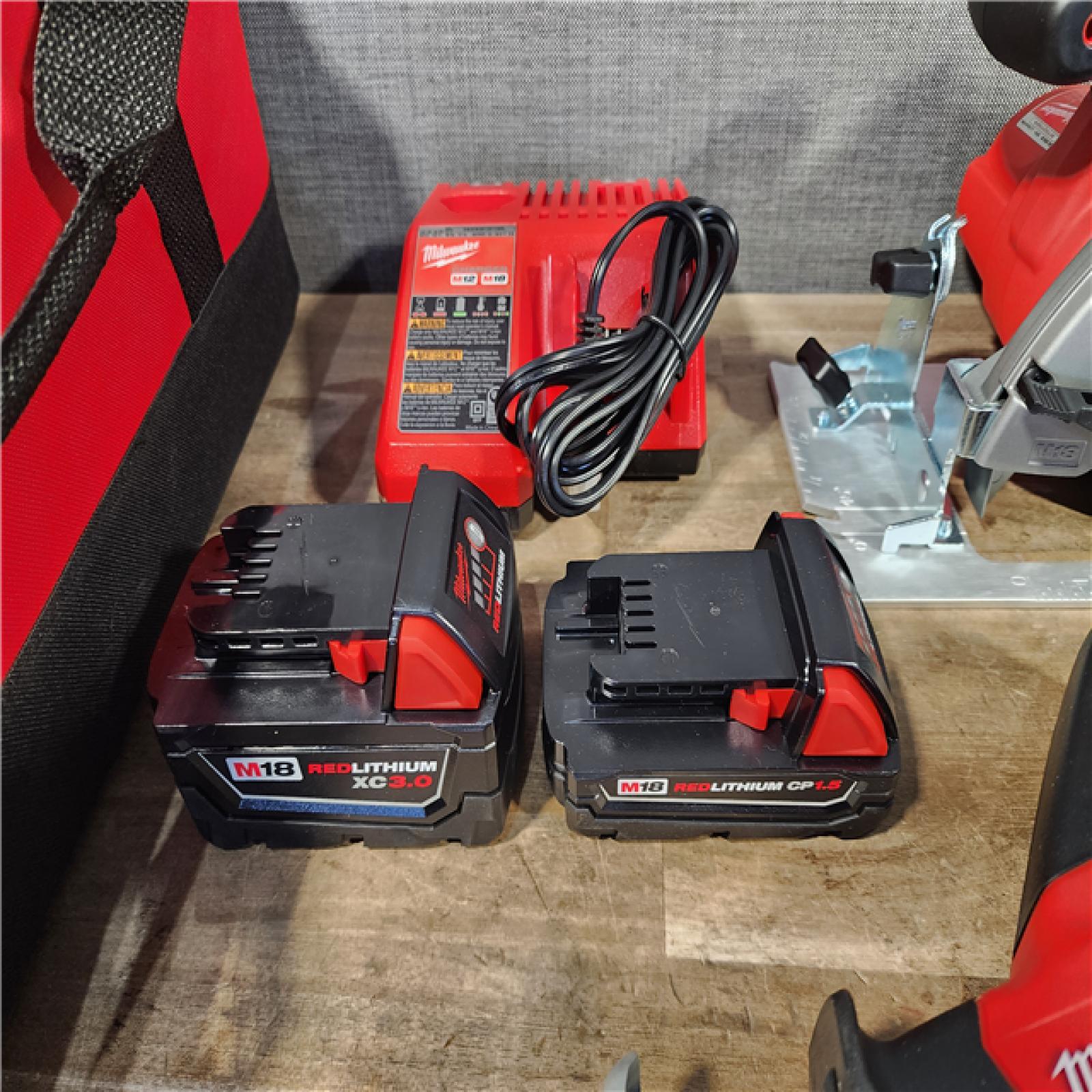 HOUSTON LOCATION - AS-IS Milwaukee M18 18-Volt Lithium-Ion Cordless Combo Tool Kit (5-Tool) with (1) 3.0Ah and (1) 1.5Ah Battery  (1) Charger  (1) Tool Bag