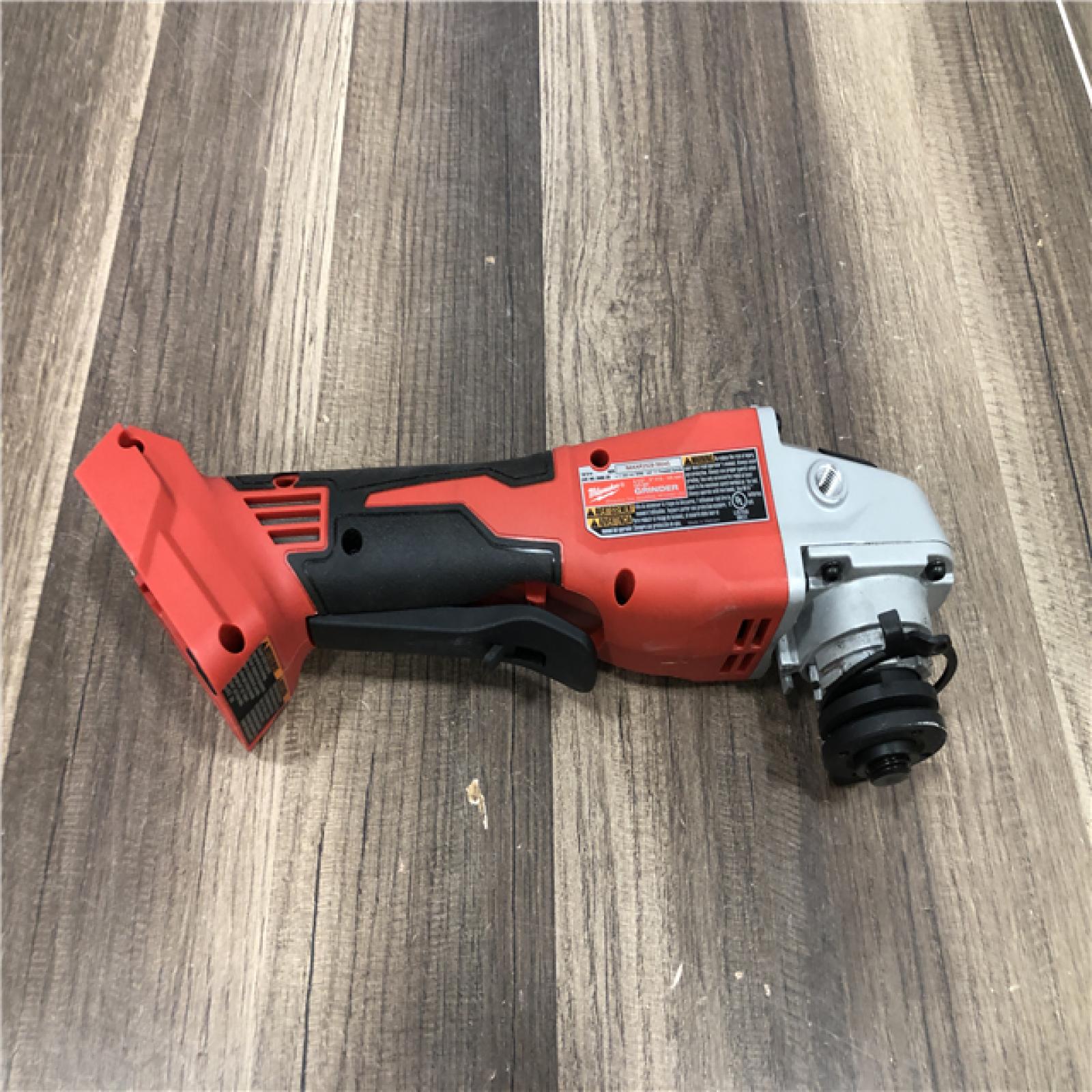 AS-IS Milwaukee 18V Lithium-Ion Brushless Cordless 4-1/2 in./5 in. Grinder w/Paddle Switch (Tool-Only)