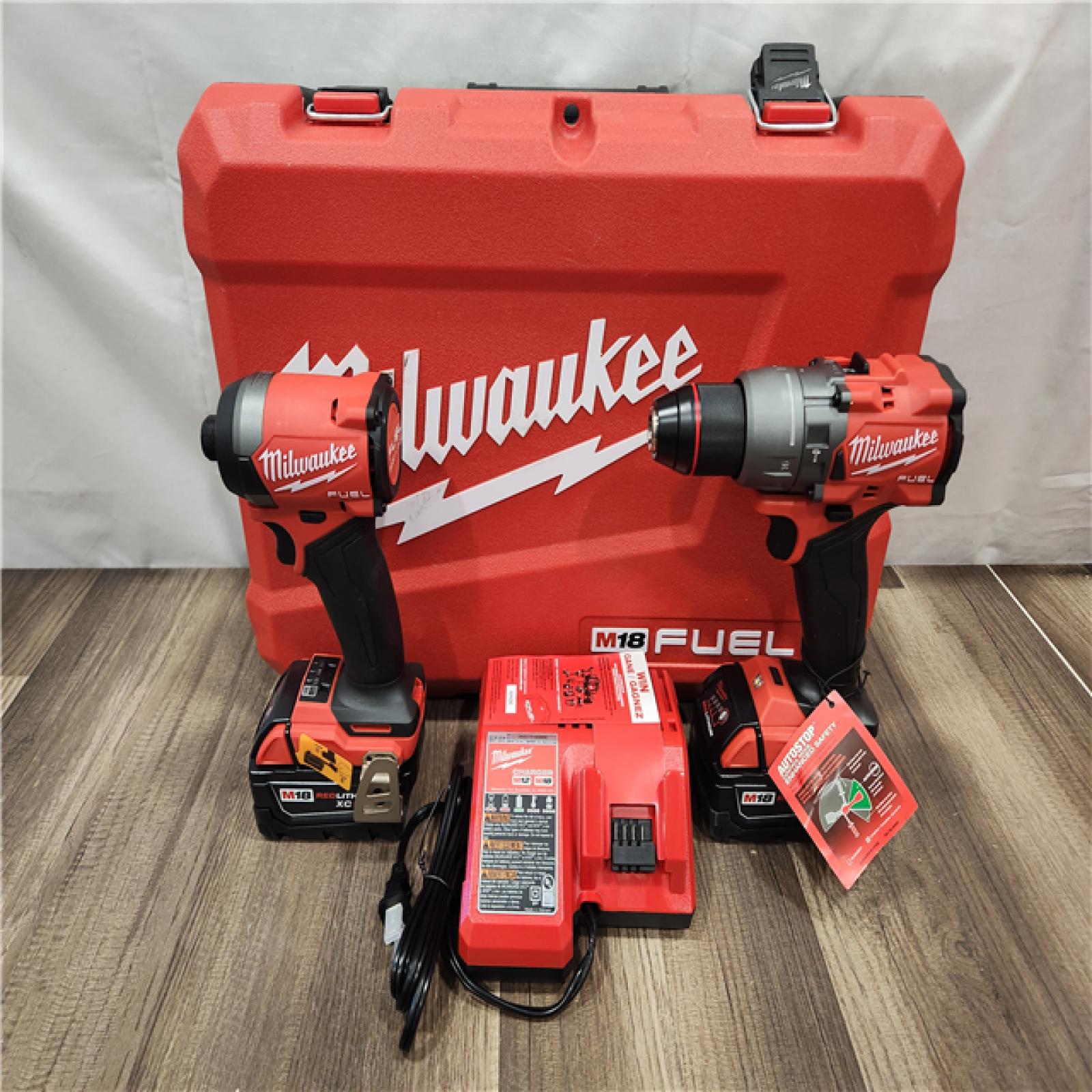 AS-IS- MILWAUKEE FUEL 18V Lithium-Ion Brushless Cordless Hammer Drill and Impact Driver Combo Kit
