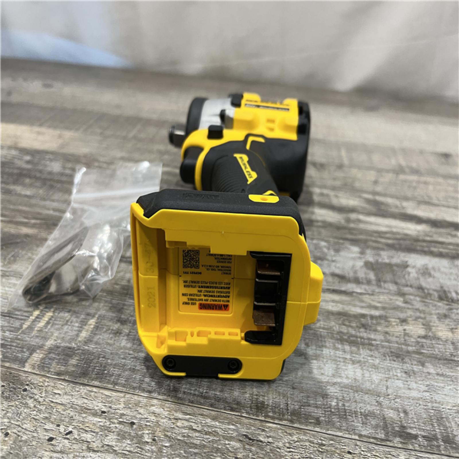 AS-IS DEWALT ATOMIC 20V MAX Cordless Brushless 1/2 in. Variable Speed Impact Wrench (Tool Only)