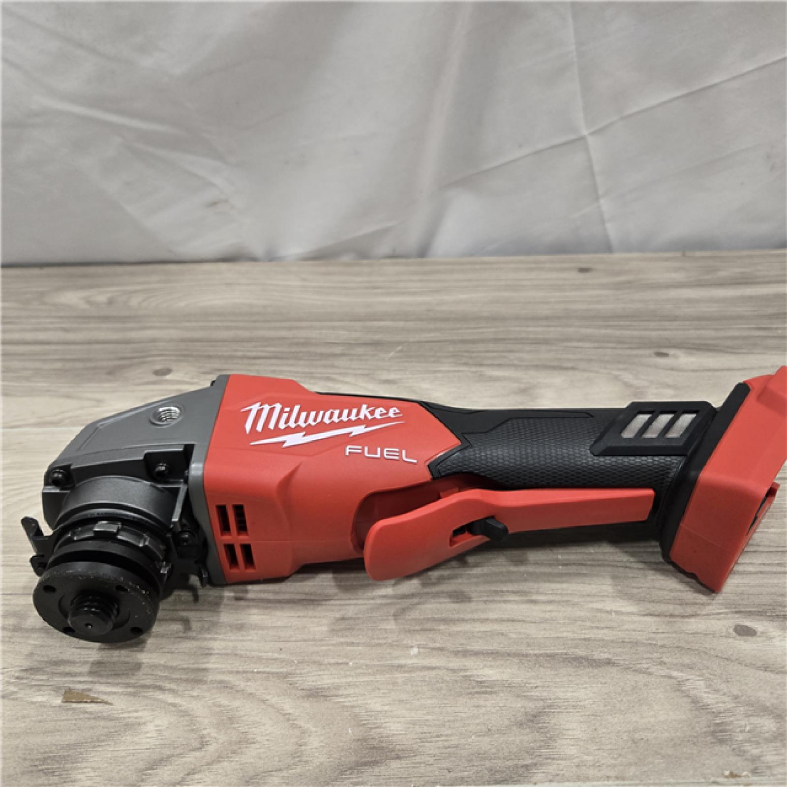 AS-IS Milwaukee 2880-20 FUEL 18V Cordless 4-1/2 in./5 in. Grinder (Tool-Only)
