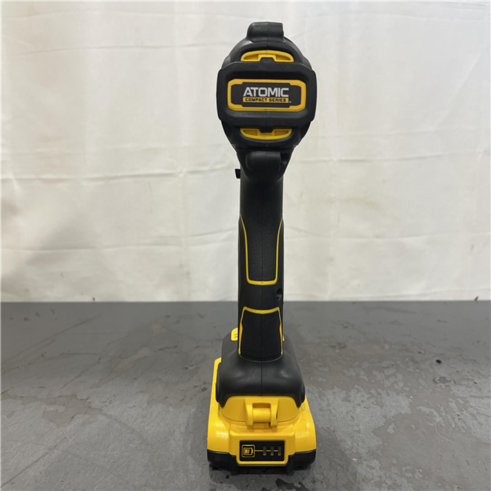 AS-IS- DeWALT ATOMIC 20V MAX Cordless Compact Impact Driver Kit W/ Li-Ion 2ah Battery  1/4  Brushless