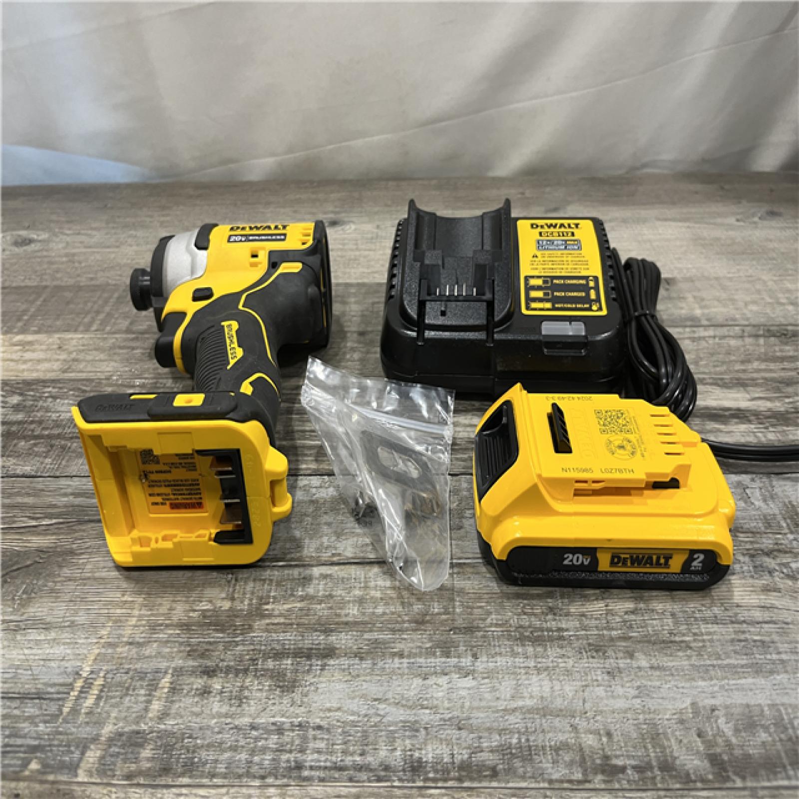 AS-IS DEWALT Atomic 20V Max Lithium-Ion Brushless Cordless Compact 1/4 in. Impact Driver Kit