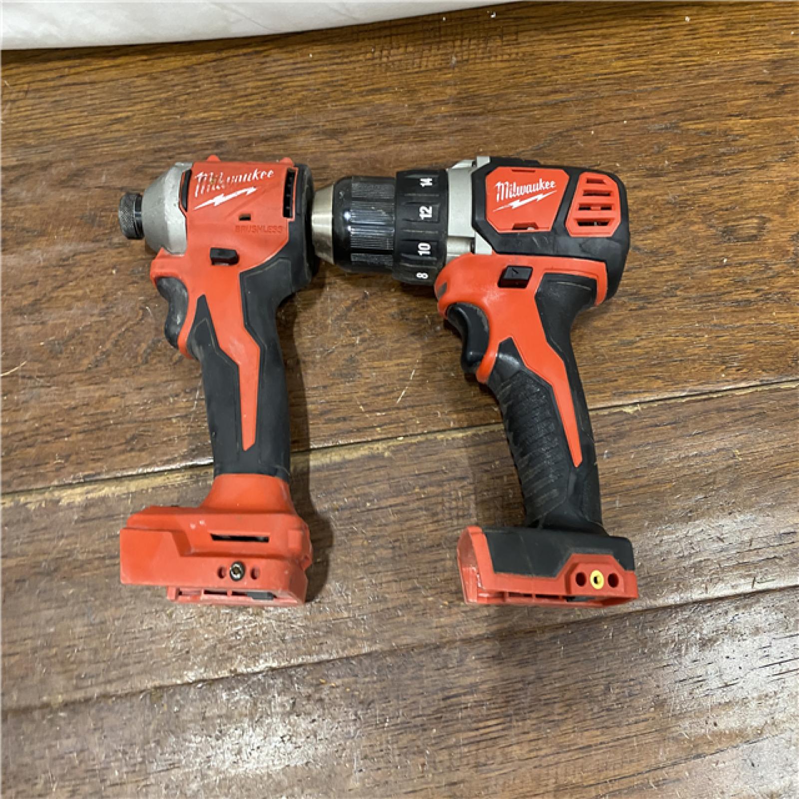 AS-IS MILWAUKEE M18 FUEL 18V Lithium-Ion Brushless Cordless Hammer Drill and Impact Driver Combo Kit (2-Tool) with 2 Batteries