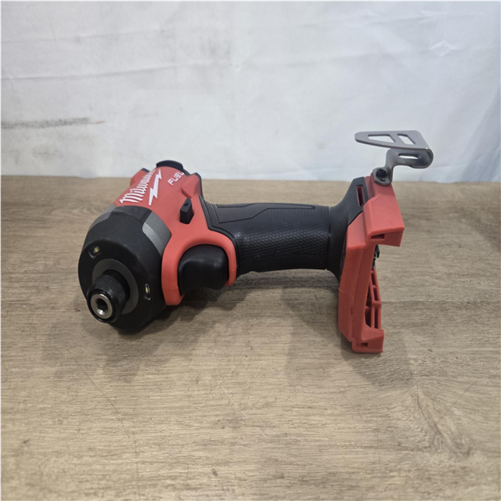 AS-IS Milwaukee FUEL 18V Lithium-Ion Brushless Cordless 1/4 in. Hex Impact Driver (Tool-Only)