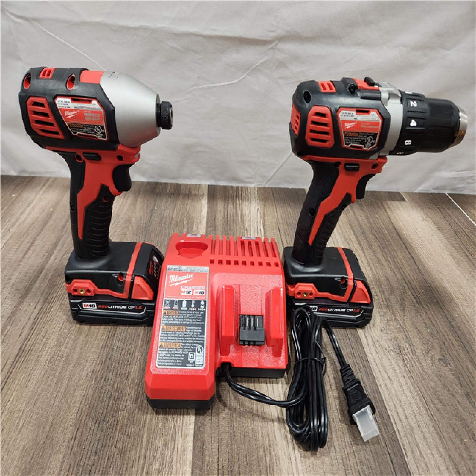 AS-IS- Milwaukee 18V Cordless Brushed 2-Tool Drill/Driver and Impact Driver Kit