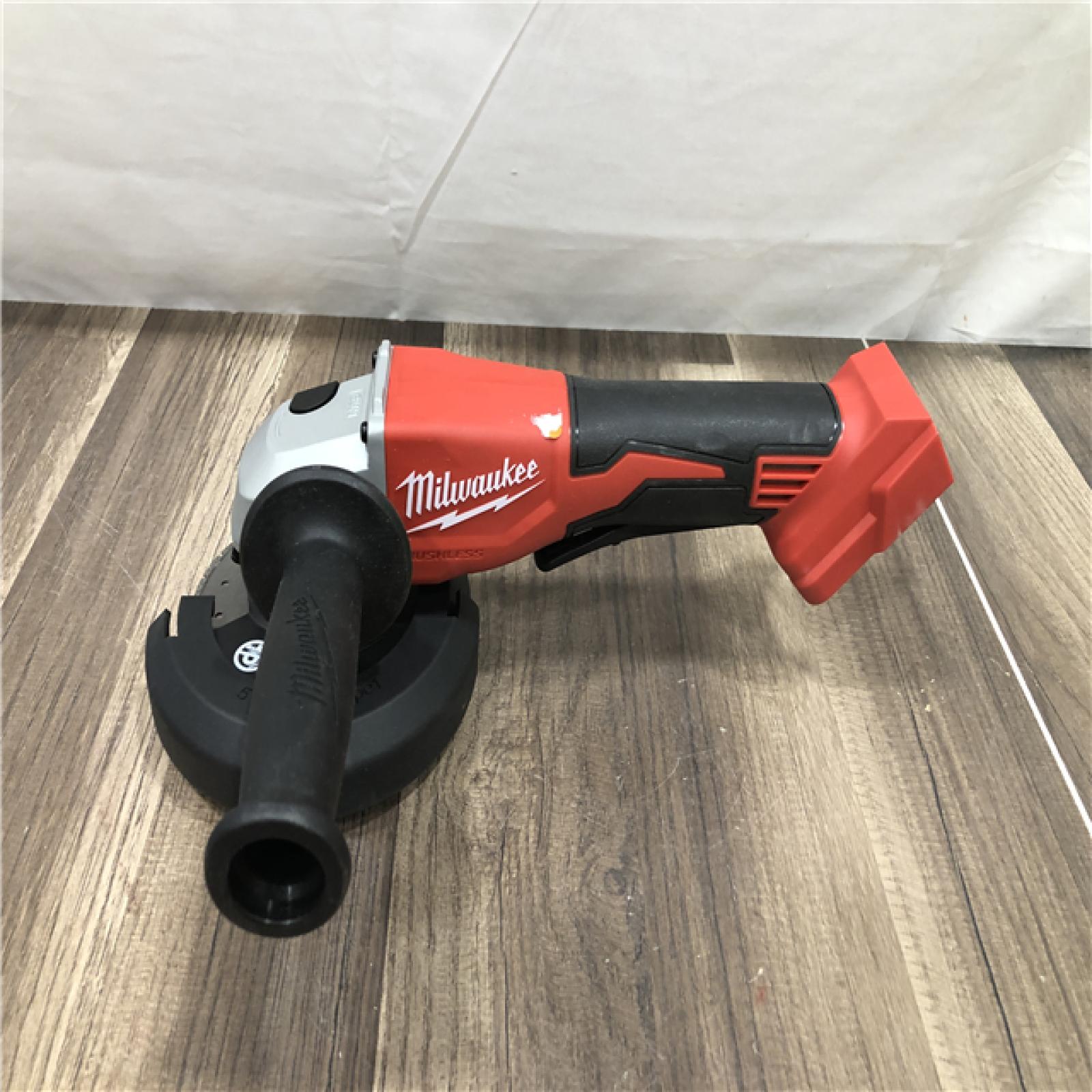 AS-IS Milwaukee 18V Lithium-Ion Brushless Cordless 4-1/2 in./5 in. Grinder w/Paddle Switch (Tool-Only)