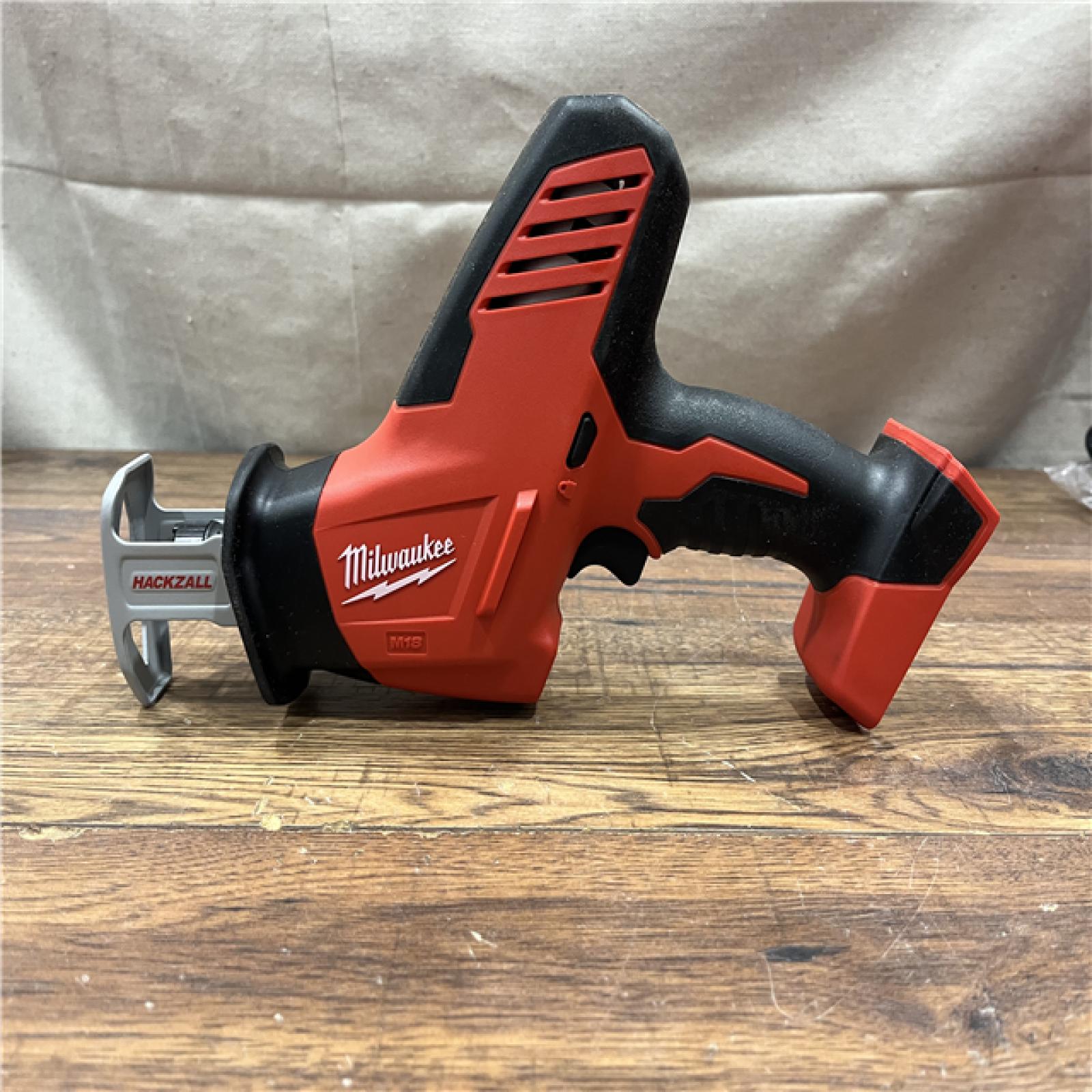 AS-IS Milwaukee M18 18-Volt Lithium-Ion Brushless Cordless Combo Kit (4-Tool) with 2-Batteries, 1-Charger and Tool Bag