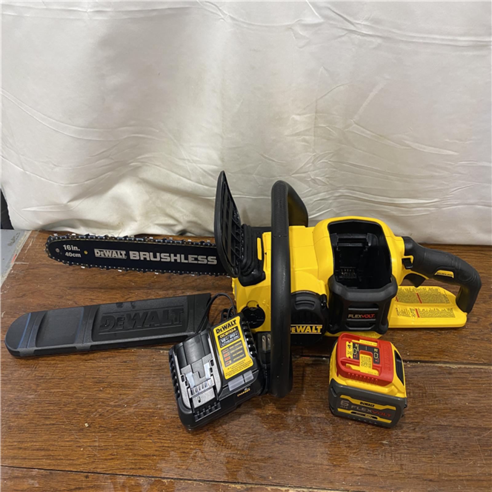 AS-IS DEWALT  FLEXVOLT 60V MAX 16in. Brushless Cordless Battery Powered Chainsaw Kit with (1) FLEXVOLT 2 Ah Battery & Charger
