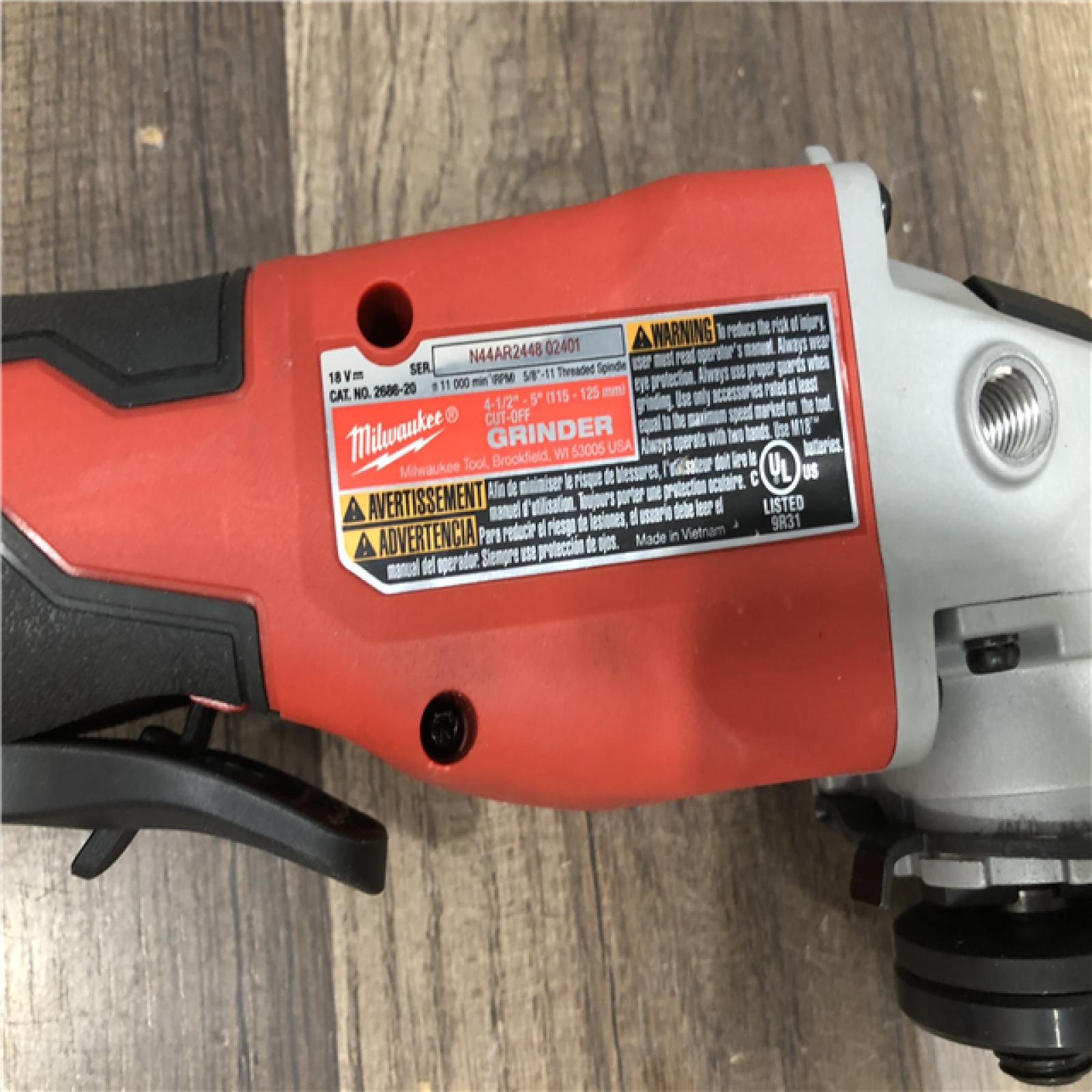 AS-IS Milwaukee 18V Lithium-Ion Brushless Cordless 4-1/2 in./5 in. Grinder w/Paddle Switch (Tool-Only)