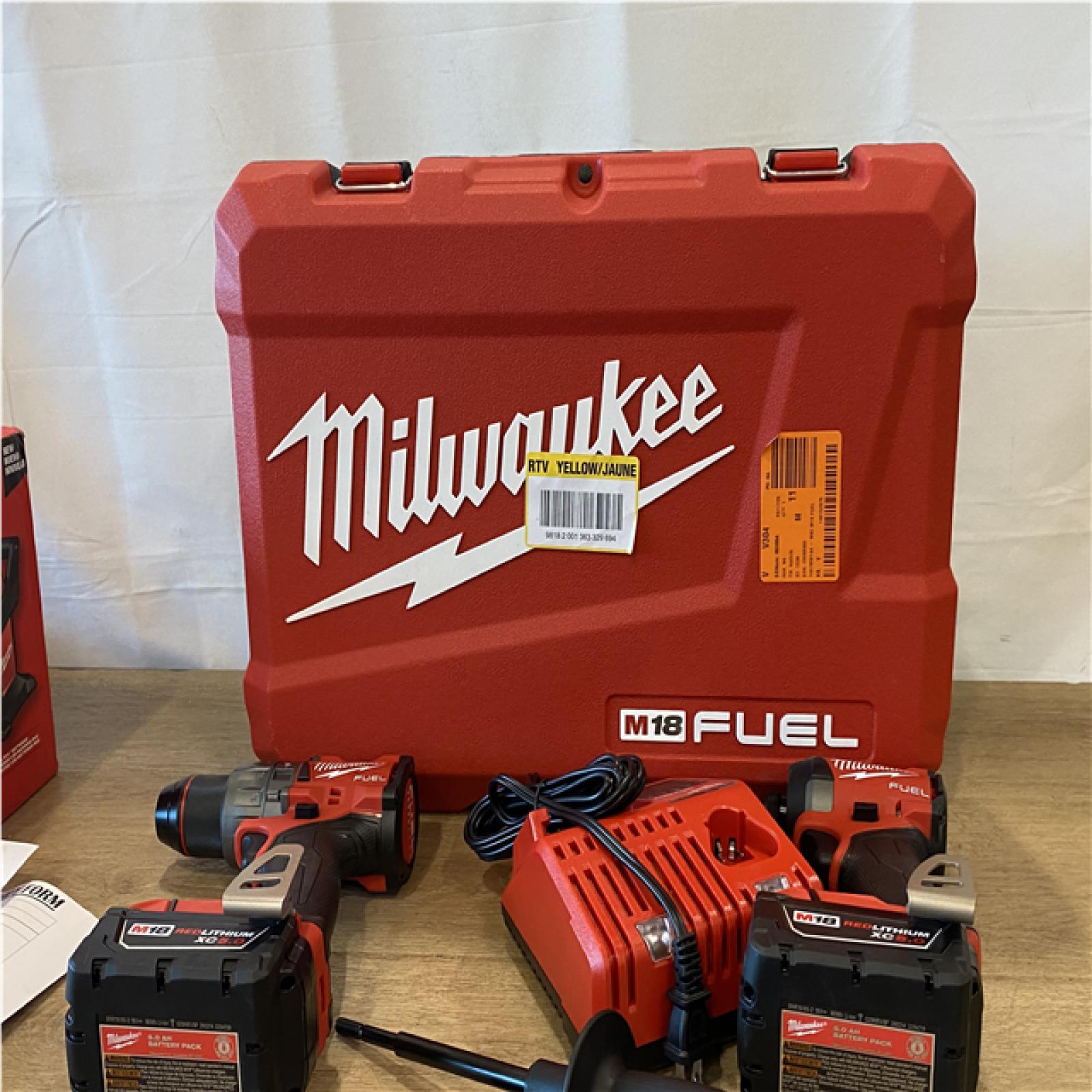 AS-IS Milwaukee FUEL 18V Lithium-Ion Brushless Cordless Hammer Drill and Impact Driver Combo Kit