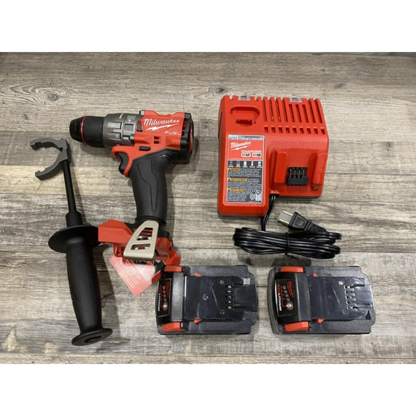 AS-IS Milwaukee FUEL 18V Lithium-Ion Brushless Cordless 1/2 in. Hammer Drill Driver Kit