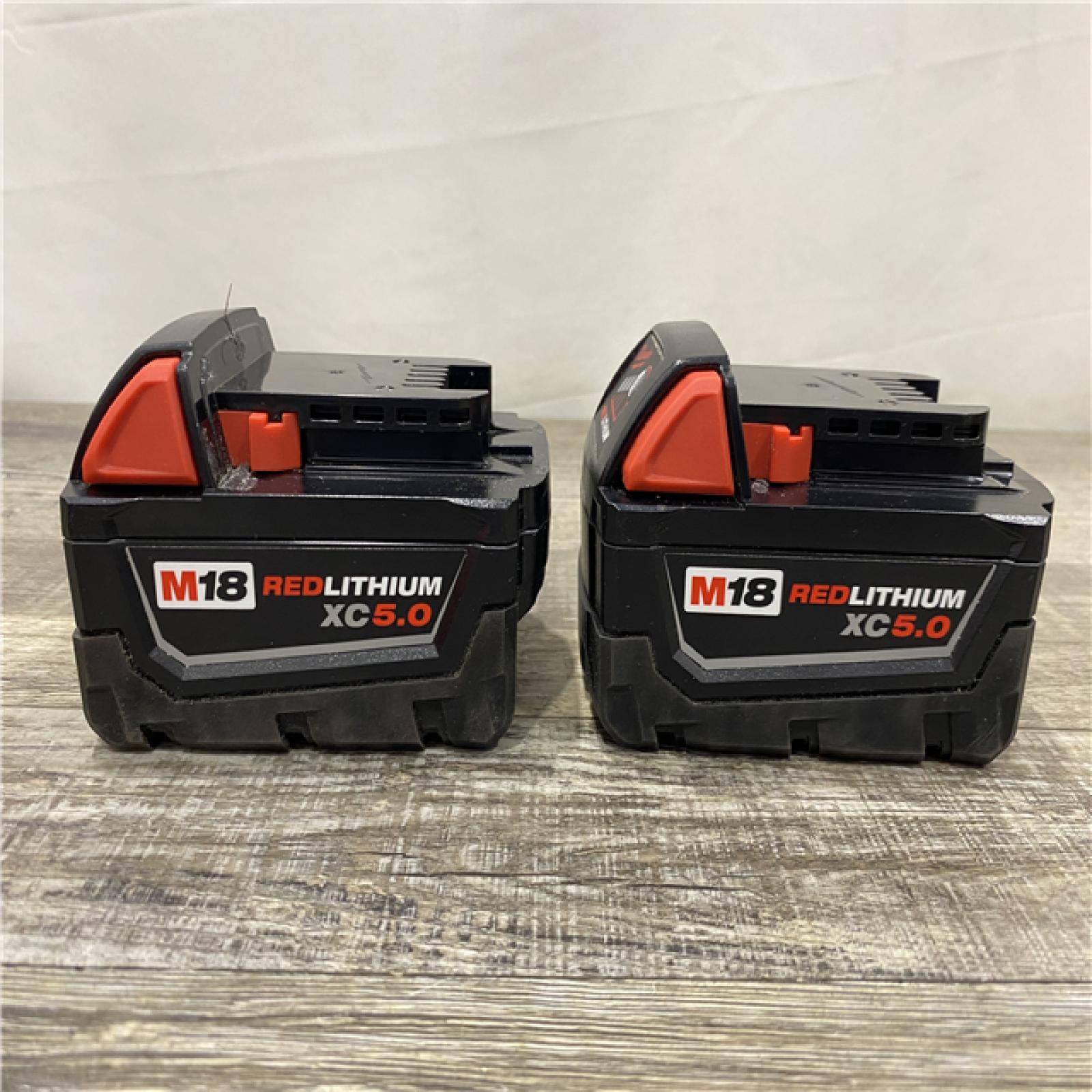 AS-IS Milwaukee 18-Volt Lithium-Ion XC Starter Kit with Two 5.0Ah Batteries and Charger