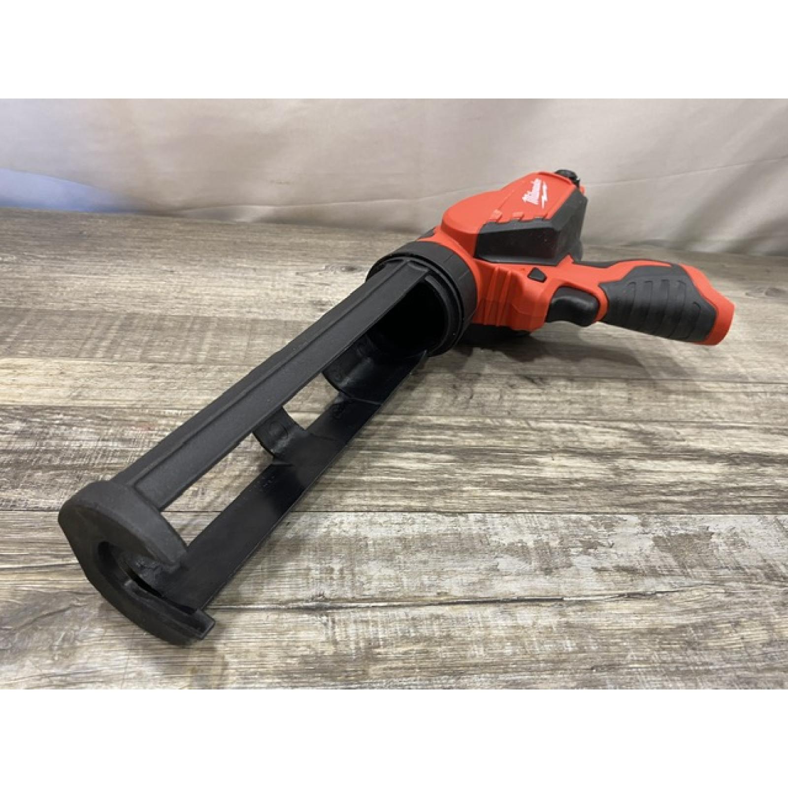 AS-IS Milwaukee 12V Lithium-Ion Cordless 10 oz. Adhesive and Caulk Gun (Tool-Only)