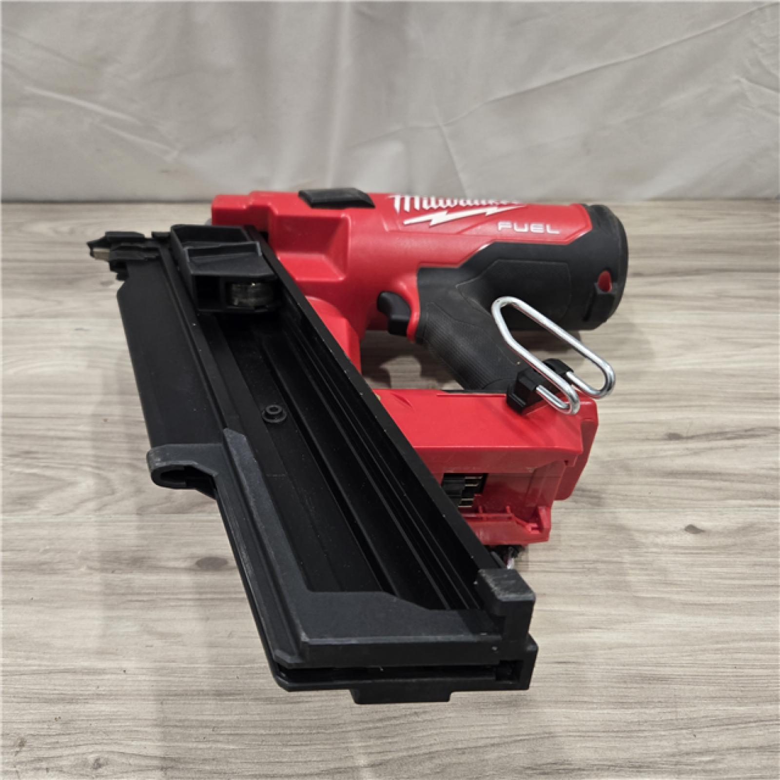 AS-IS Milwaukee 2744-20 M18 FUEL 3-1/2 in. 18V 21-Degree Cordless Framing Nailer (Tool-Only)