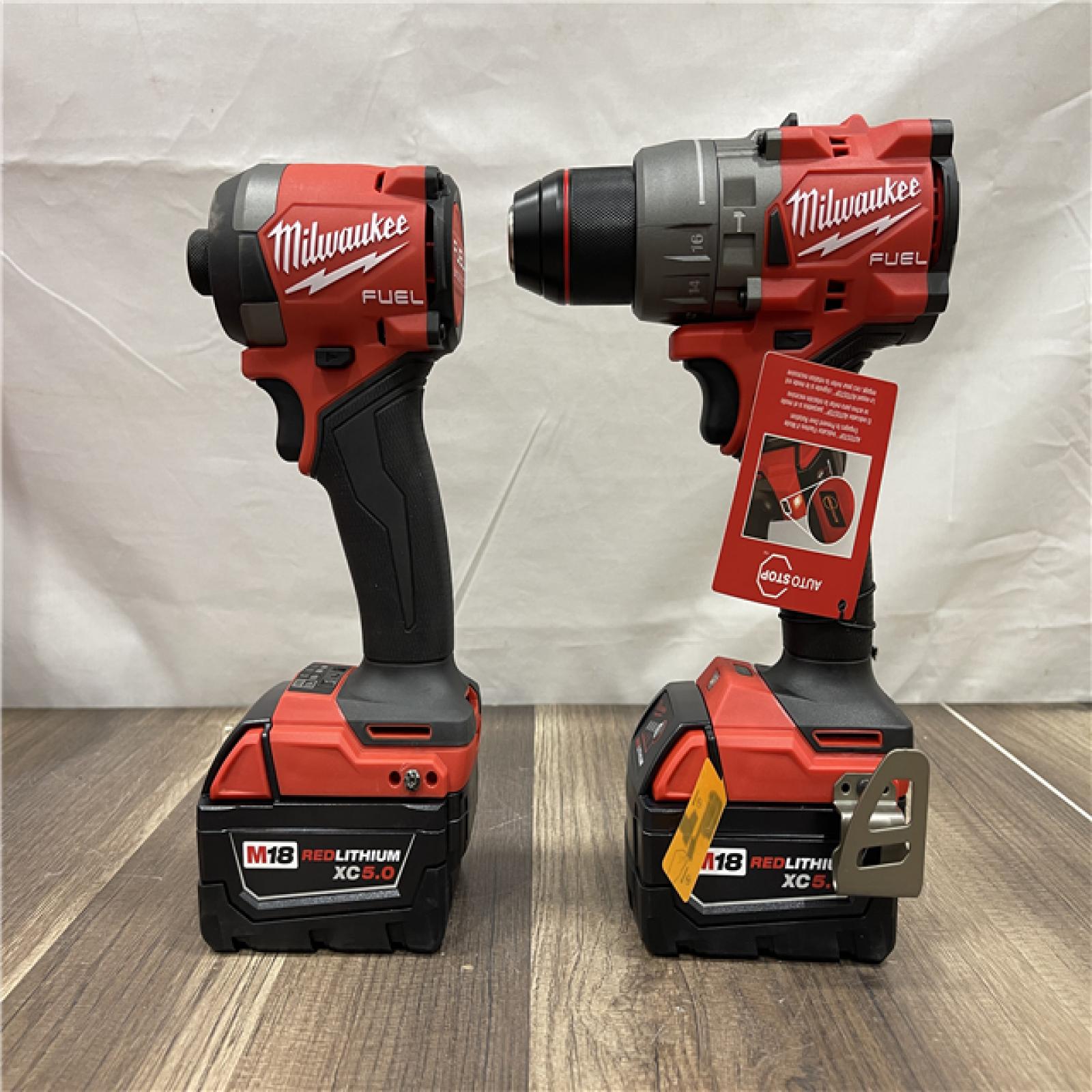 AS-IS Milwaukee FUEL 18V Lithium-Ion Brushless Cordless Hammer Drill and Impact Driver Combo Kit