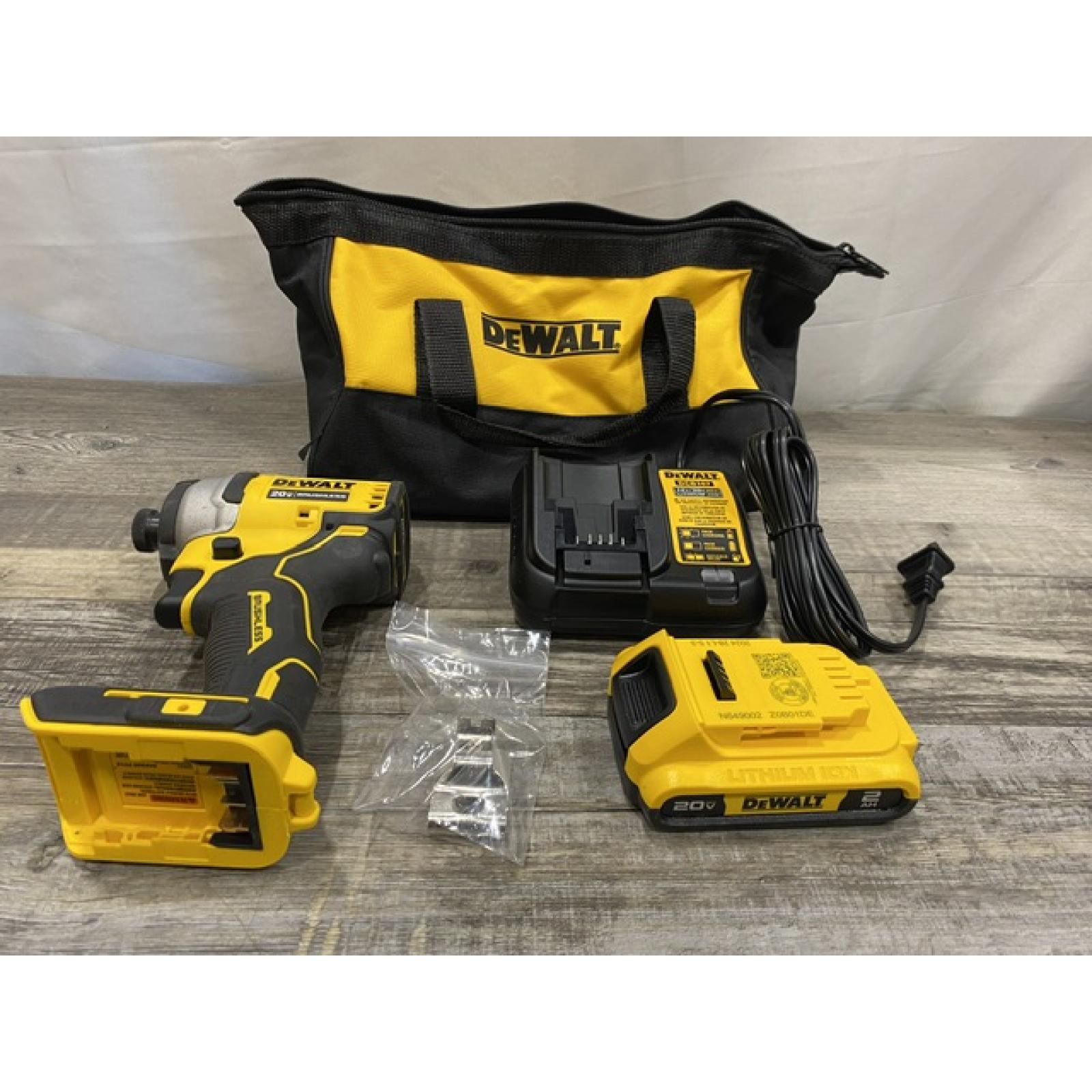 AS-IS DEWALT Atomic 20V Max Lithium-Ion Brushless Cordless Compact 1/4 in. Impact Driver Kit