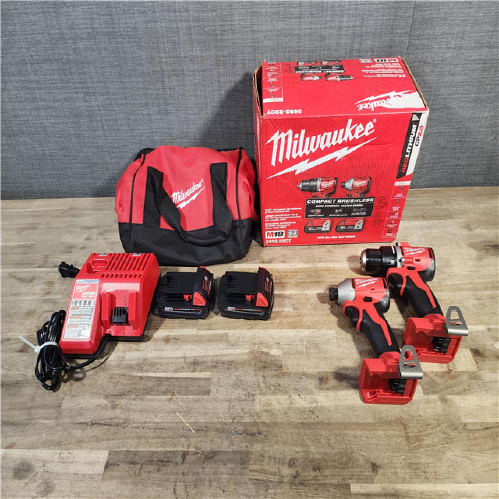 HOUSTON LOCATION - AS-IS Milwaukee M18 18V Lithium-Ion Brushless Cordless Compact Drill/Impact Combo Kit (2-Tool) W/(2) 2.0 Ah Batteries, Charger & Bag