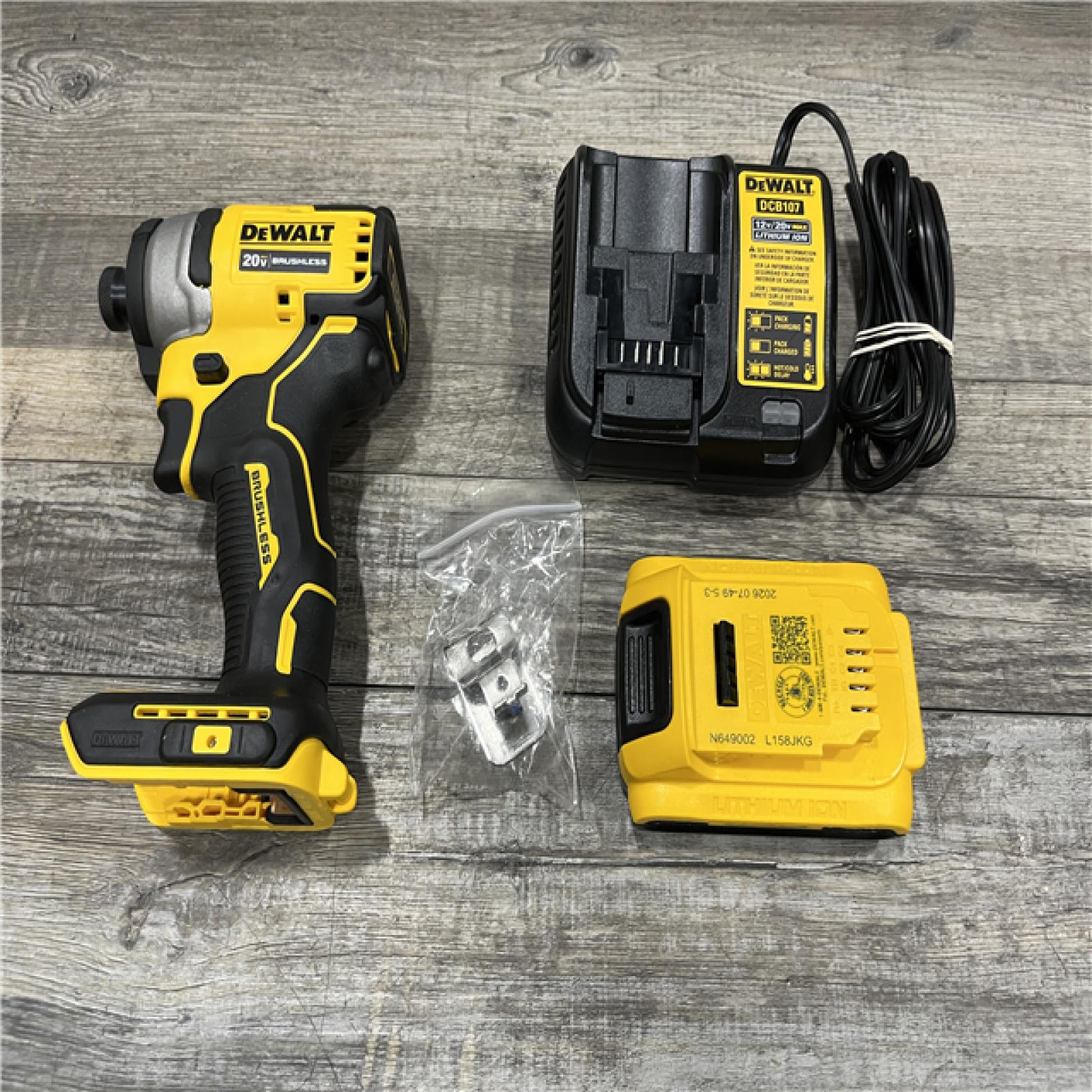 AS-IS DEWALT Atomic 20V Max Lithium-Ion Brushless Cordless Compact 1/4 in. Impact Driver Kit