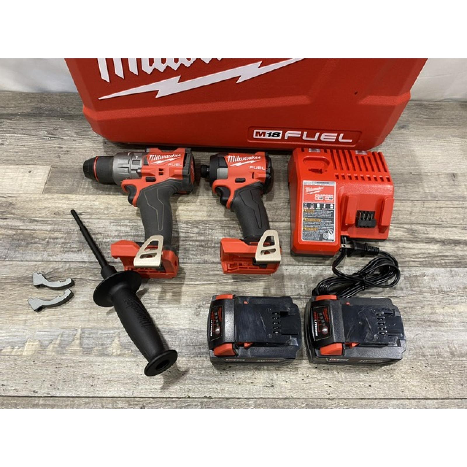 AS-IS Milwaukee FUEL 18V Lithium-Ion Brushless Cordless Hammer Drill and Impact Driver Combo Kit