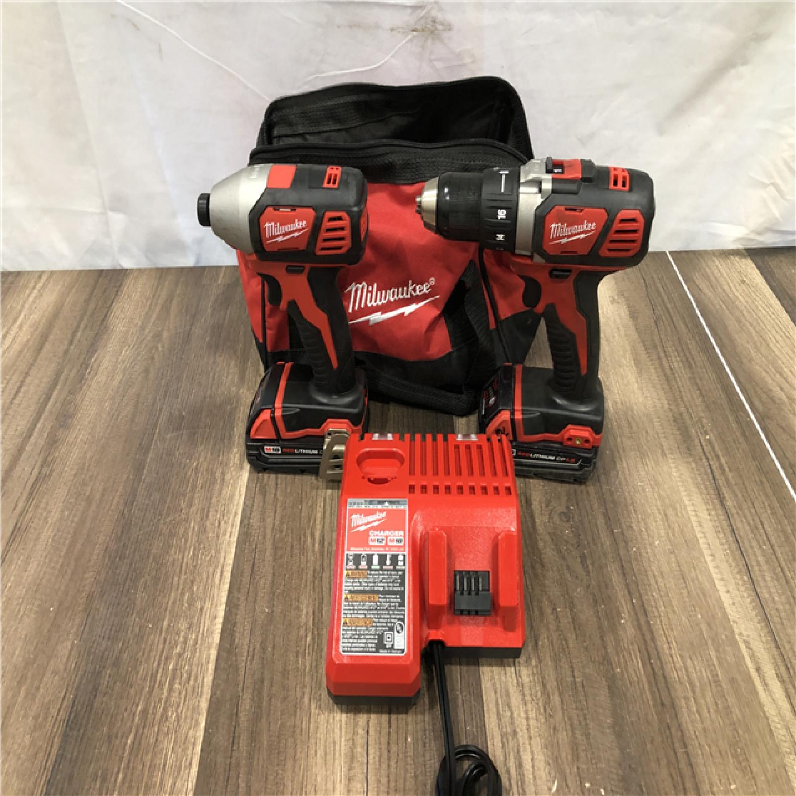 AS-IS Milwaukee 18V Lithium-Ion Cordless Drill Driver/Impact Driver Combo Kit