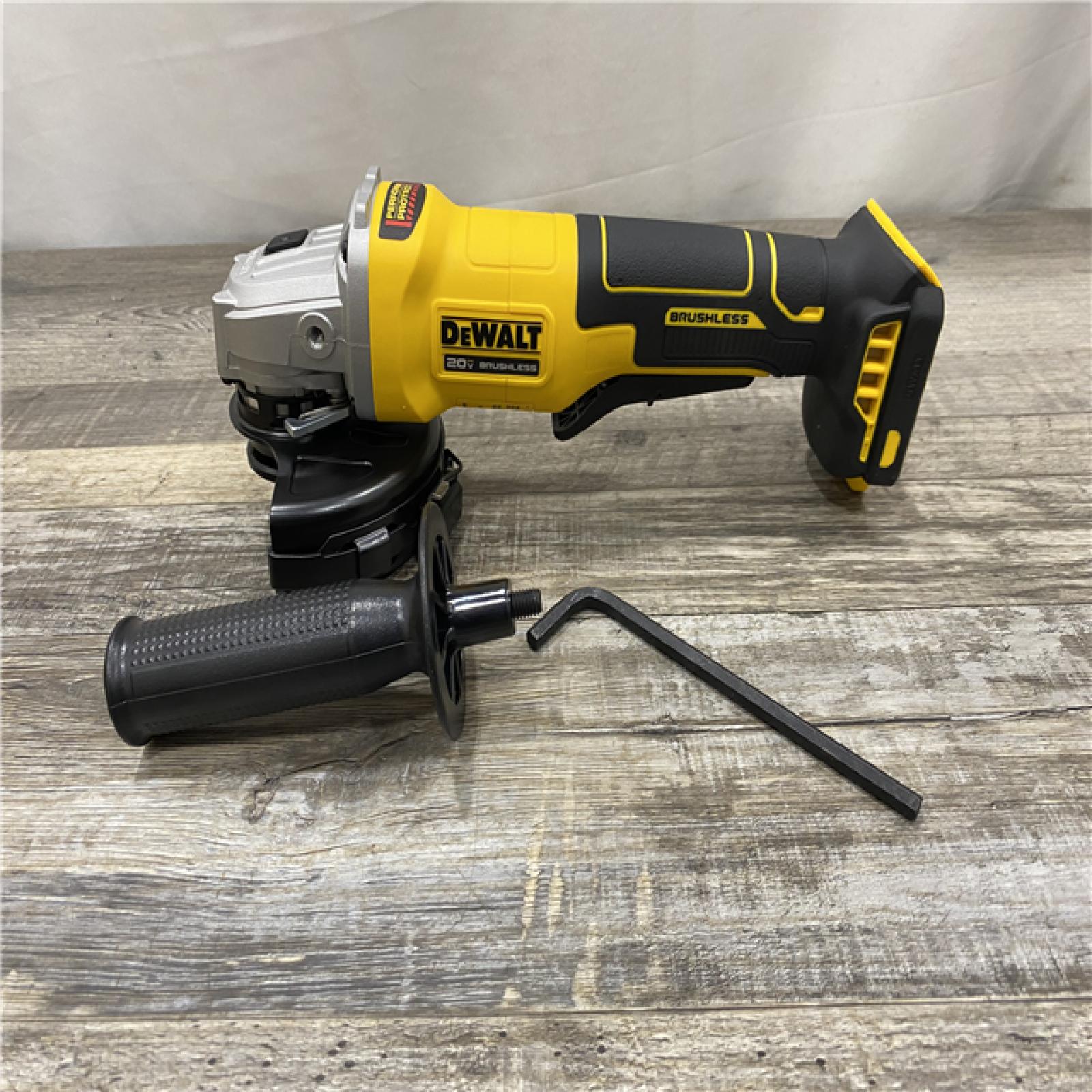AS-IS DEWALT 20V MAX Cordless Brushless 4-1/2 in. Angle Grinder with Paddle Switch (Tool Only)