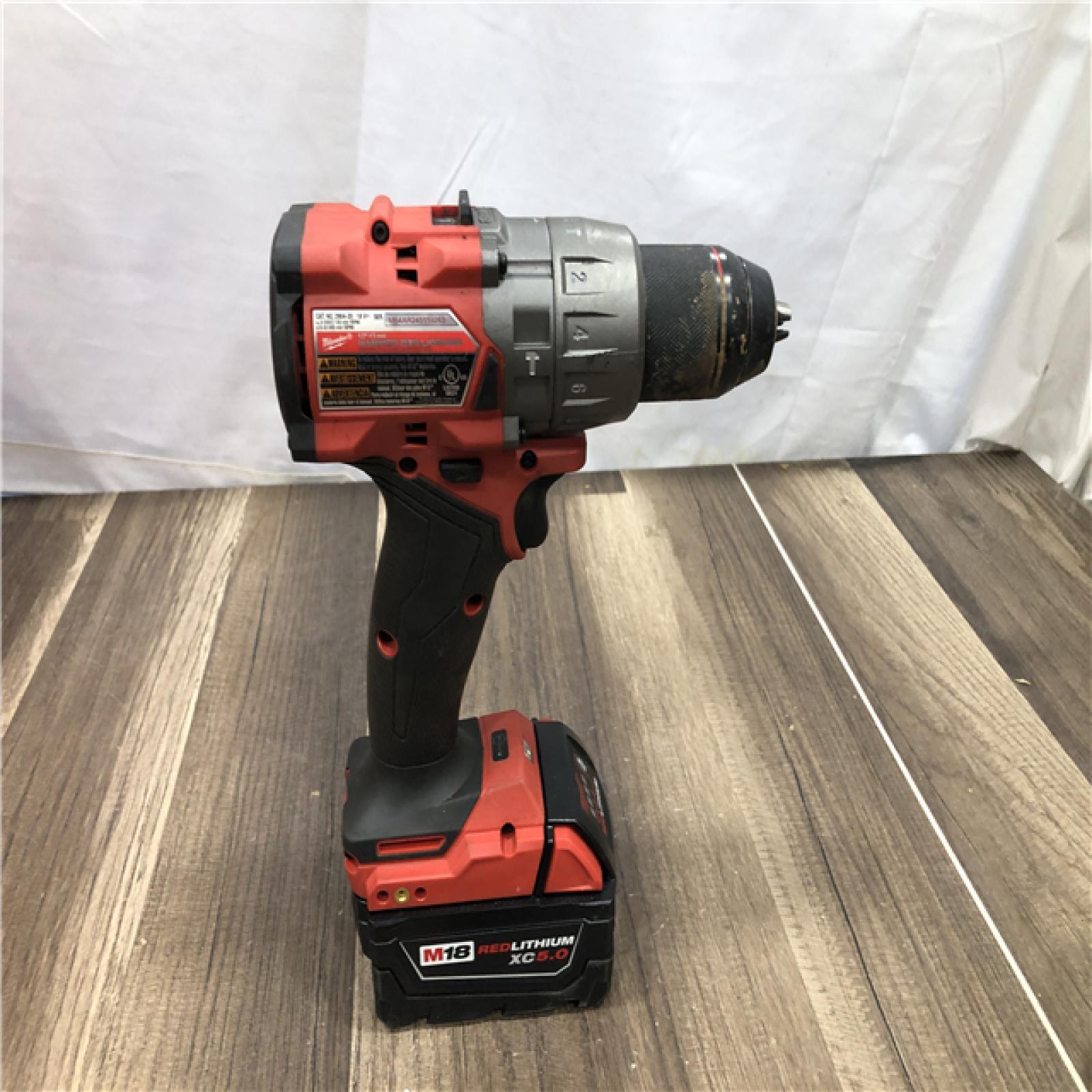 AS-IS Milwaukee FUEL 18V Lithium-Ion Brushless Cordless 1/2 in. Hammer Drill Driver Kit