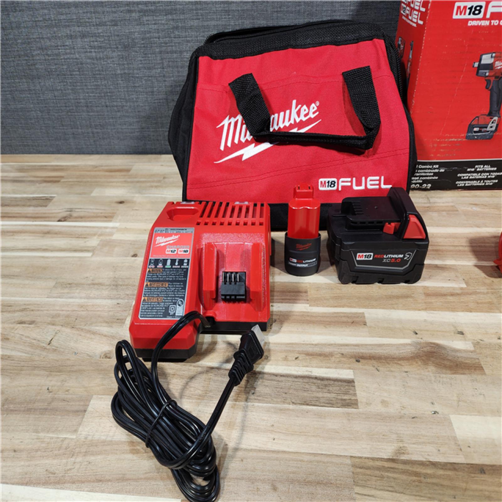 HOUSTON LOCATION - AS-IS Milwaukee FUEL 18V Cordless Mid Torque 1/2 in. Impact Wrench w/ M12 FUEL 3/8 in. Ratchet & Battery/Charger Combo Kit