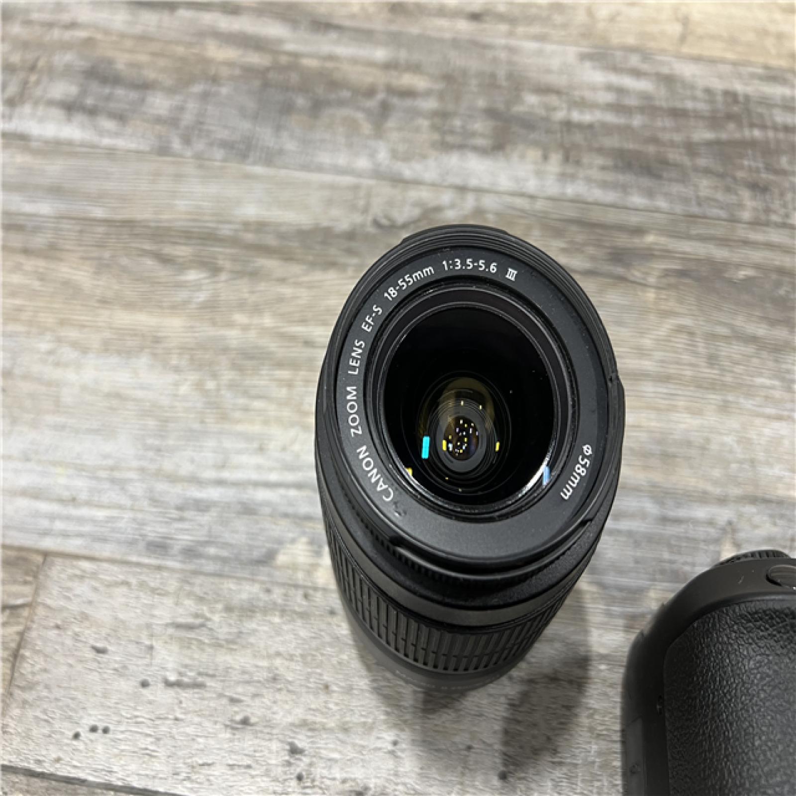 AS-IS Canon EOS Rebel T100 DSLR Camera w/ 18-55mm f/3.5-5.6 DC III Lens Kit