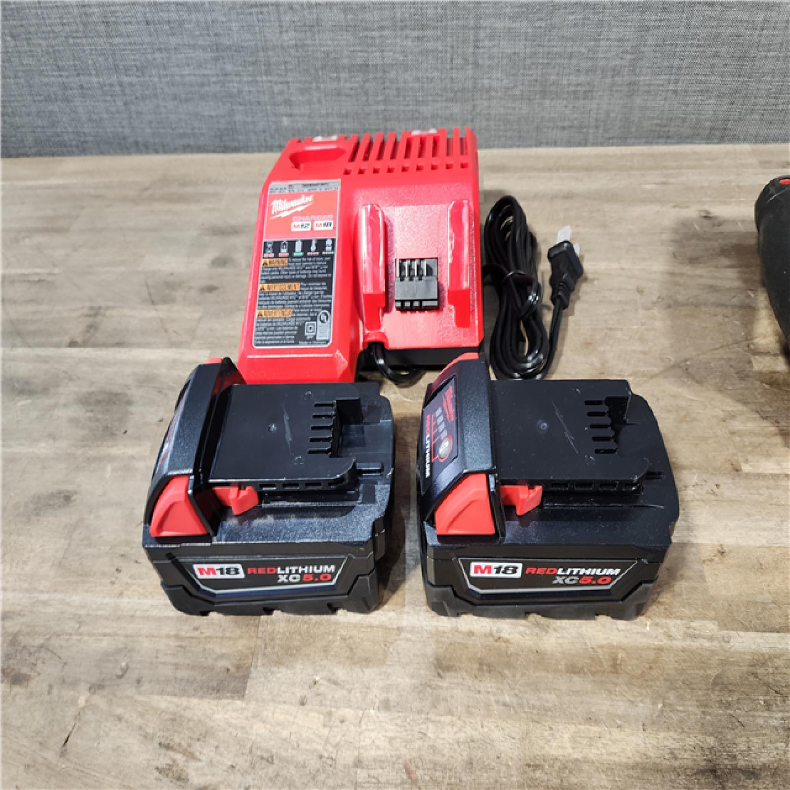 HOUSTON LOCATION - AS-IS MILWAUKEE 3 TOOL COMBO KIT W/ (2) BATTERY & CHARGER