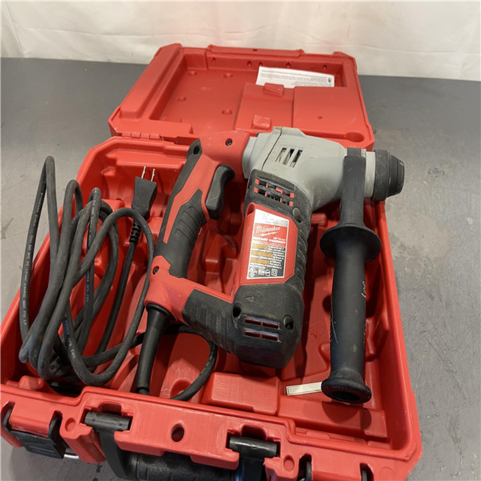 AS-IS - Milwaukee 5.5 Amp 5/8 in. Corded SDS-plus Concrete/Masonry Rotary Hammer Drill Kit