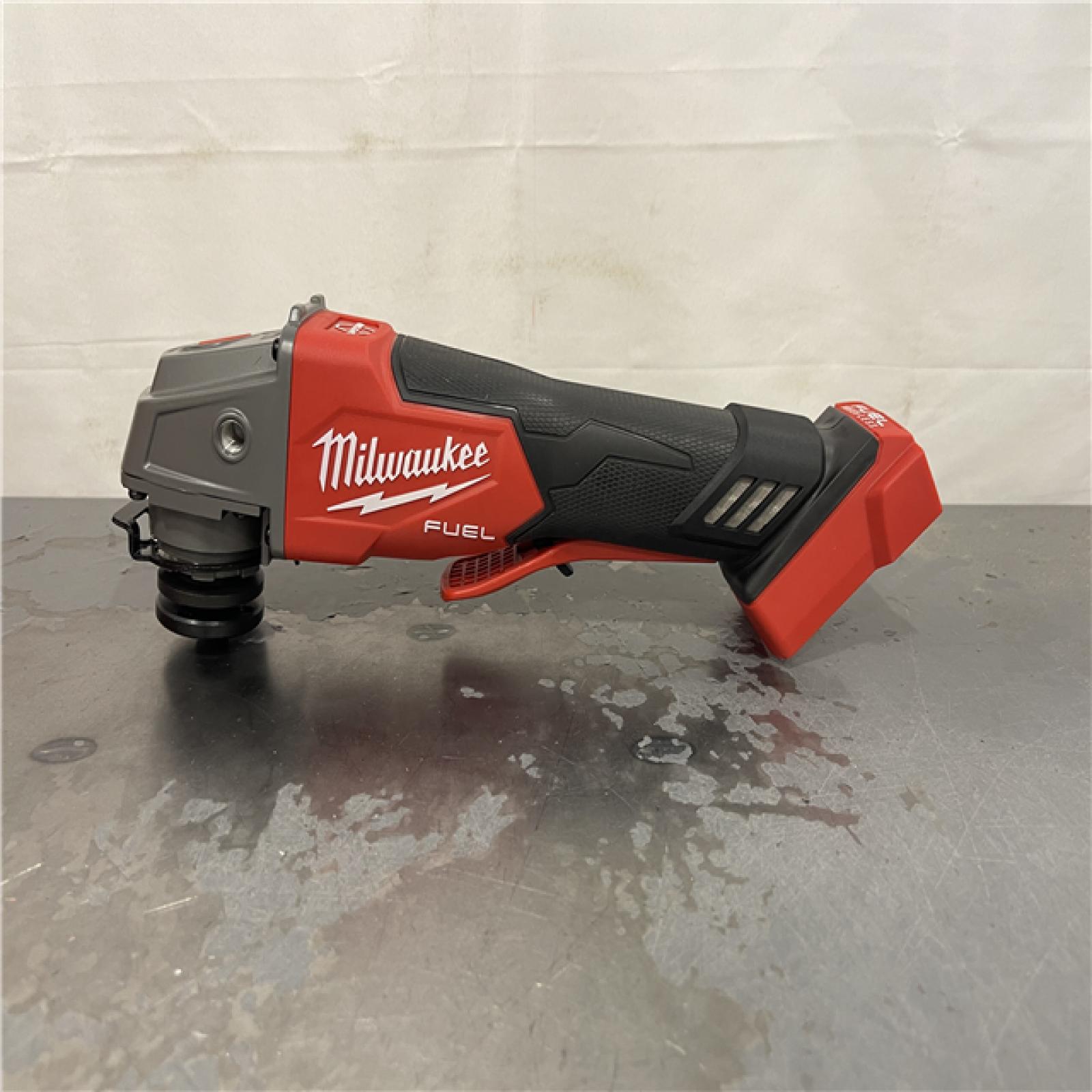 AS-IS- Milwaukee FUEL 18-Volt Lithium-Ion Brushless Cordless 4-1/2 in./5 in. Grinder W/Paddle Switch (Tool-Only)