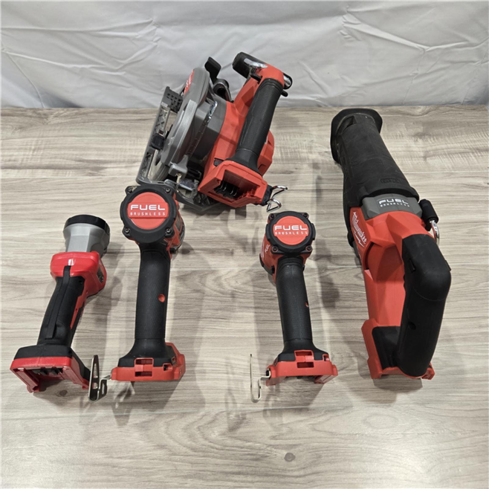 AS-IS M18 FUEL 18V Lithium-Ion Brushless Cordless Combo Kit (5-Tool) with Two 5.0 Ah Batteries, 1 Charger 1 Tool Bag