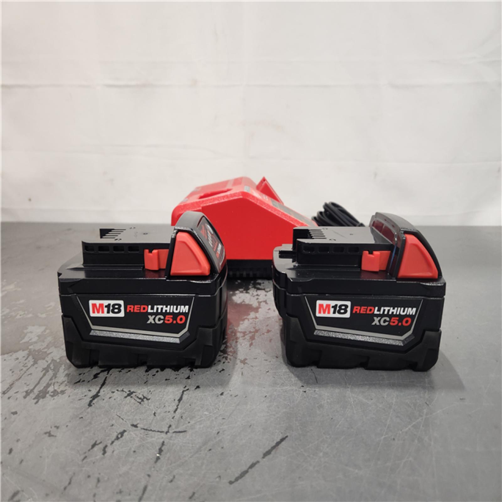 AS-IS- Milwaukee M18 18-Volt Lithium-Ion XC Starter Kit with Two 5.0Ah Batteries and Charger