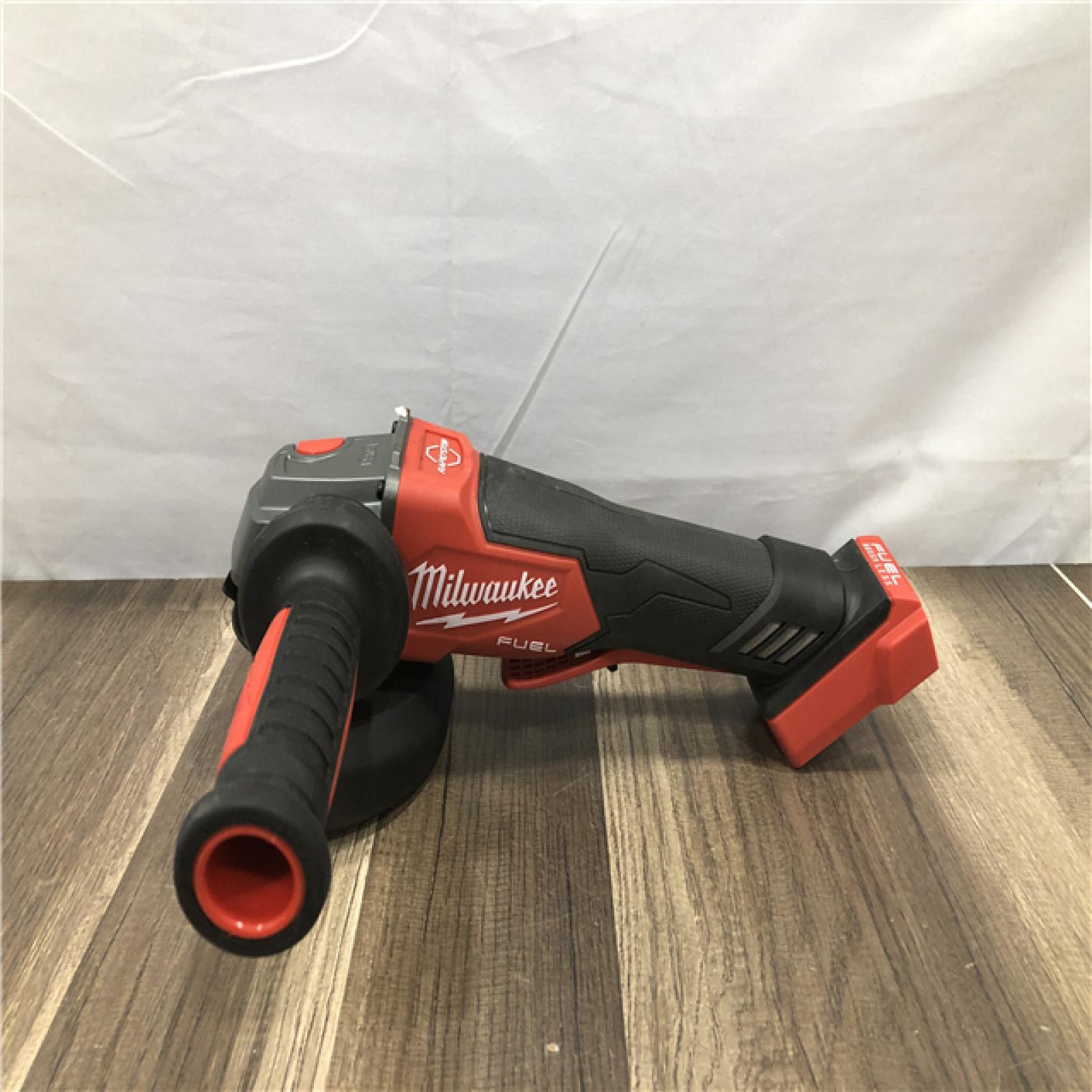 AS-IS Milwaukee FUEL 18V Lithium-Ion Brushless Cordless 4-1/2 in./5 in. Grinder w/Paddle Switch (Tool-Only)