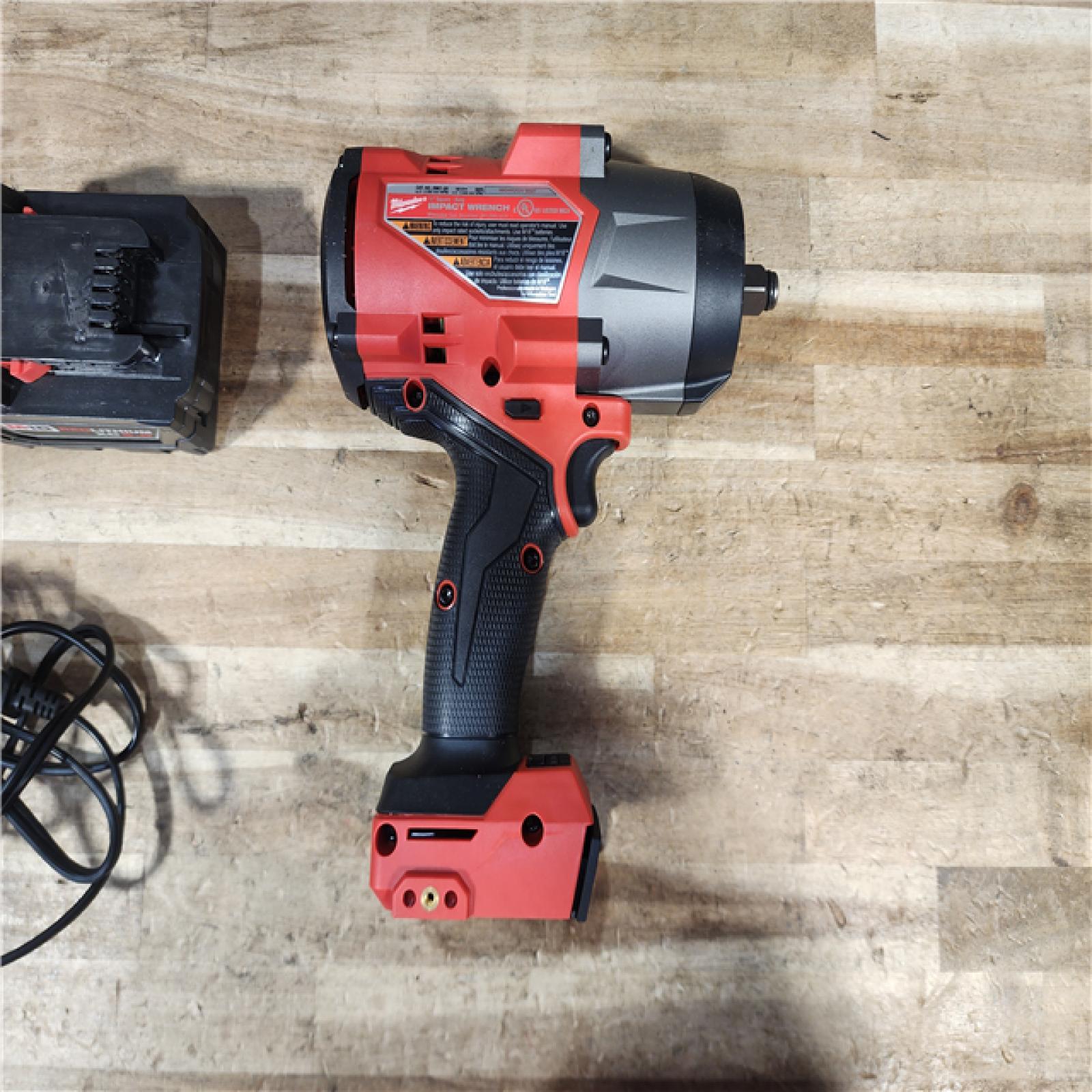 HOUSTON LOCATION - AS - IS Milwaukee FUEL 18V Lithium-Ion Brushless Cordless 1/2 in. Impact Wrench with Friction Ring W/ BATTERY & CHARGER